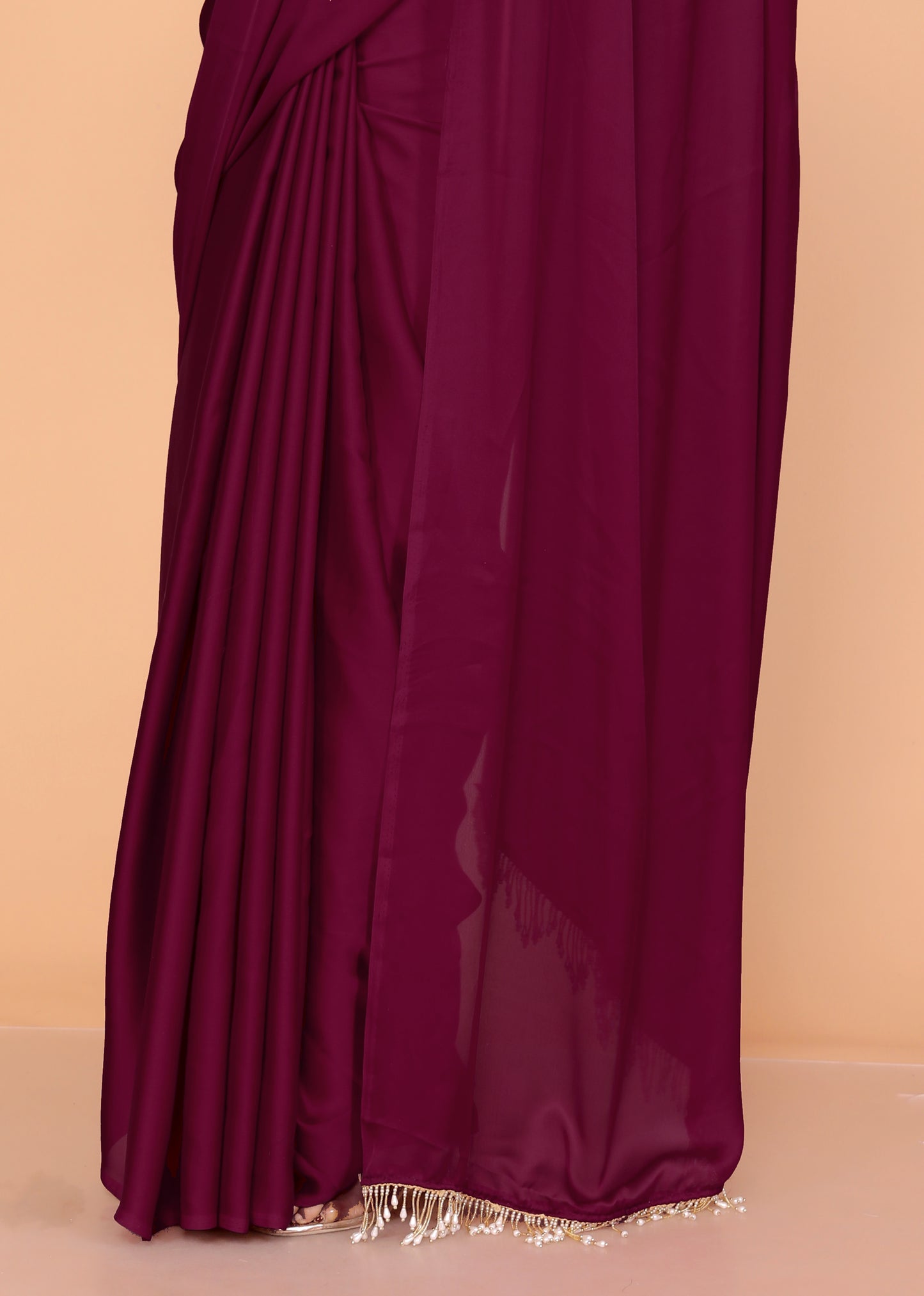 CREPE PLAIN TASSELS WORK BURGENDY SAREE BY SKFBHOLUBHAI