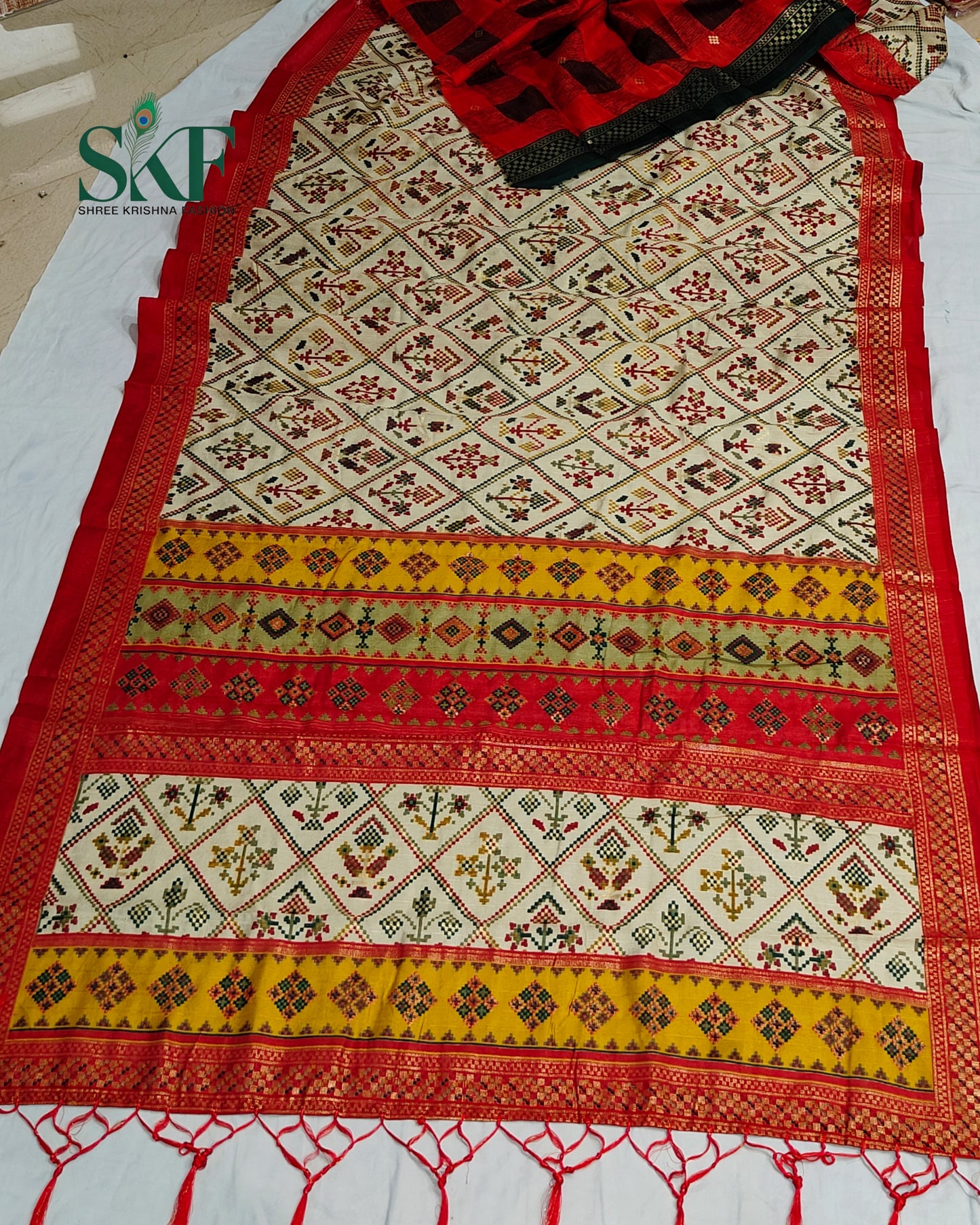 MAURA SILK PATOLA FOIL PRINT WEAVING BEIDGE SAREE BY SKFBHOLUBHAI