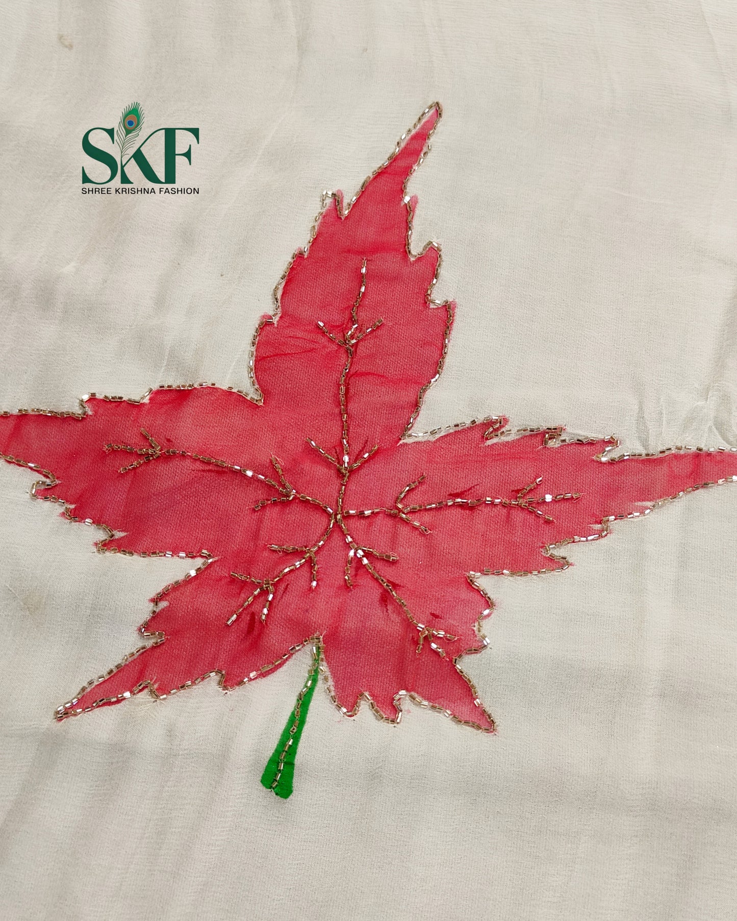 CHIFFON BRUSH PRINT LEAF KARDANA HANDWORK BUTTY WHITE SAREE BY SKFBHOLUBHAI