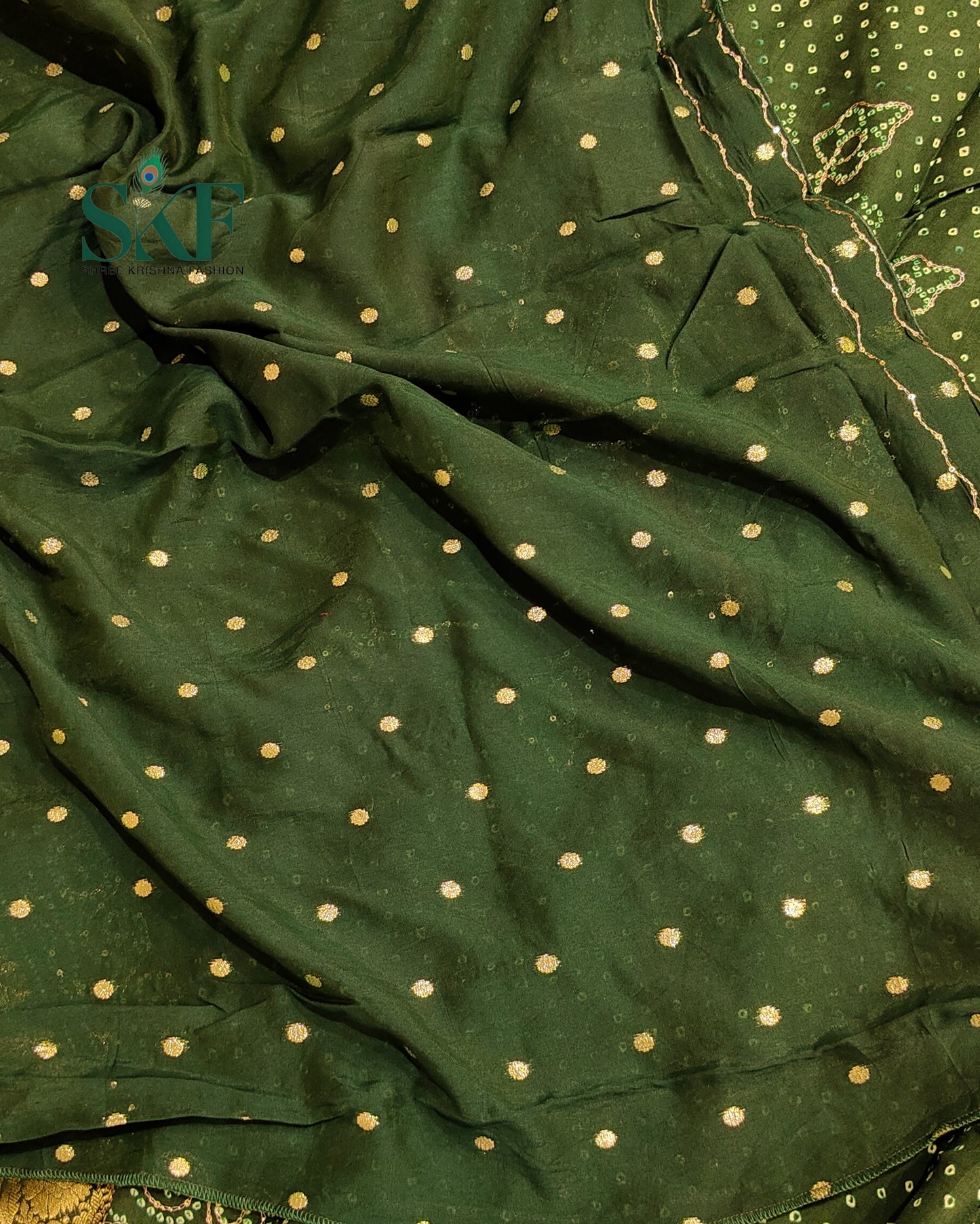 HO SILK BHANDHANI PEACOCK MOTIF AARI AND SEQUENCE WORK BOTTLE GREEN SAREE BY SKFBHOLUBHAI