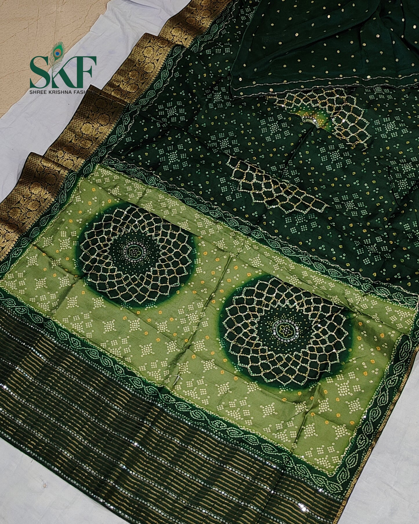 HO SILK BHANDHANI MIRROR WORK TWO TONE BOTTLE GREEN AND MEHNDI GREEN SAREE BY SKFBHOLUBHAI