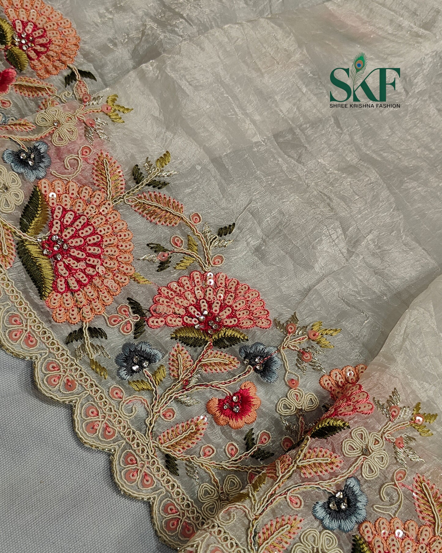 CRUSH TISSUE SIPPI SEQUENCE EMBROIDERY WORK IVORY SAREE BY SKFBHOLUBHAI