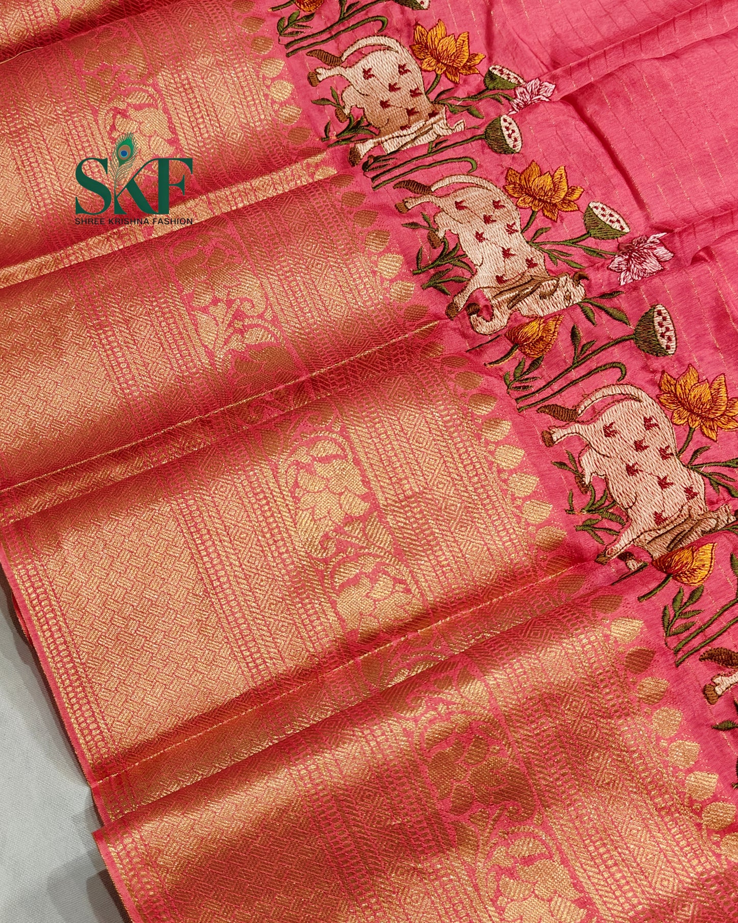 DOLA SILK MOTIF EMBROIDERY PANEL WEAVING BORDER WORK BLUSH PINK SAREE BY SKFBHOLUBHAI