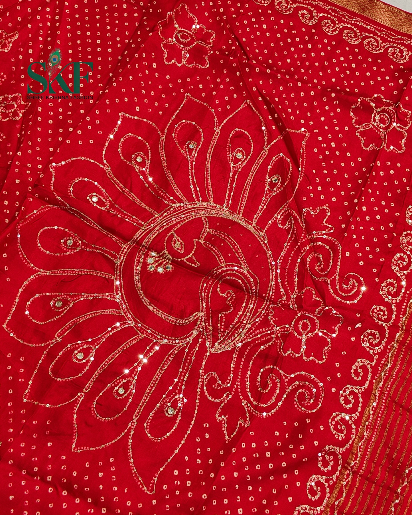 HO SILK BHANDHANI PEACOCK MOTIF AARI AND SEQUENCE WORK RED SAREE BY SKFBHOLUBHAI