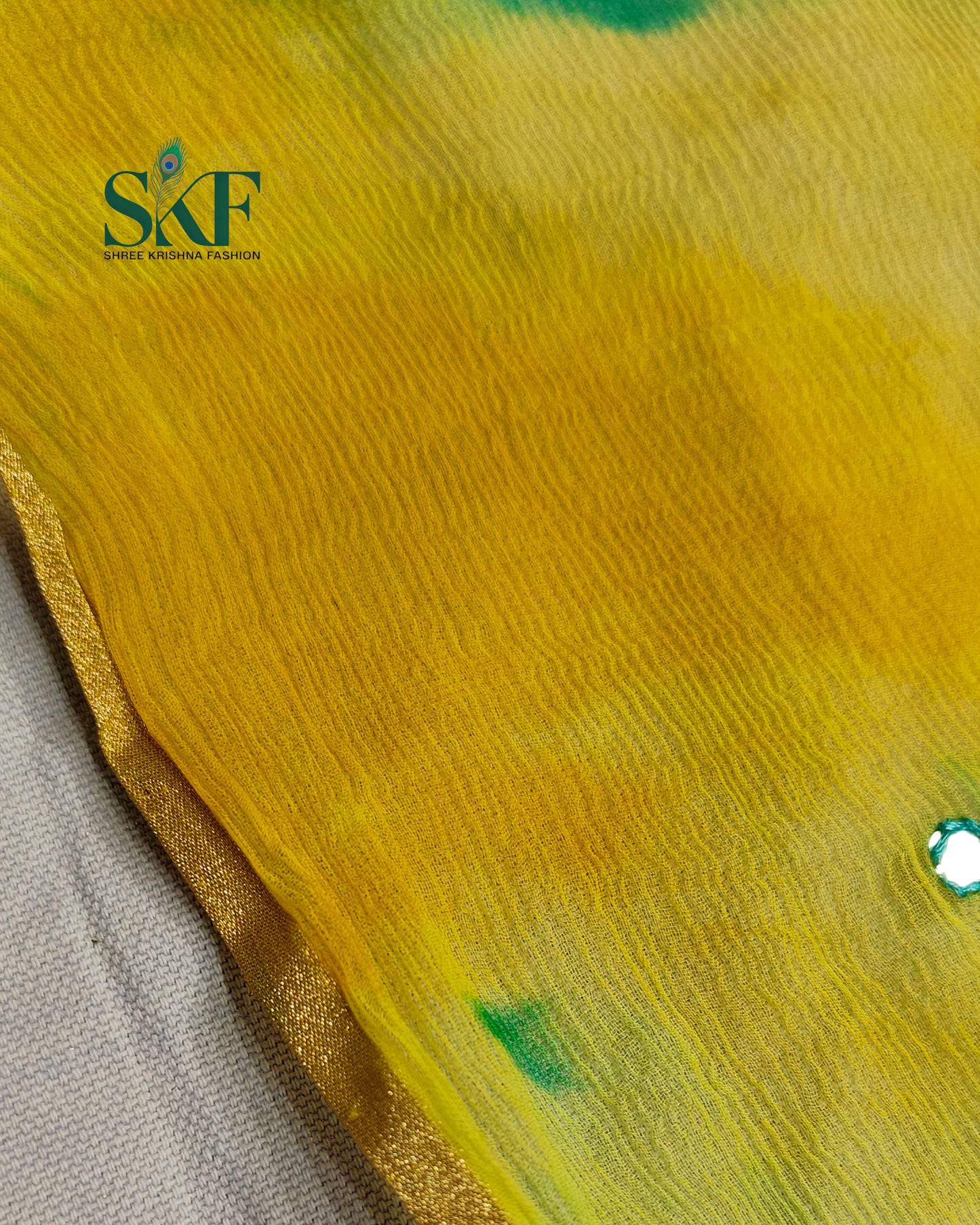 CHIFFON TIEDYE THREAD MIRROR WORK RAMAGREEN SAREE BY SKFBHOLUBHAI