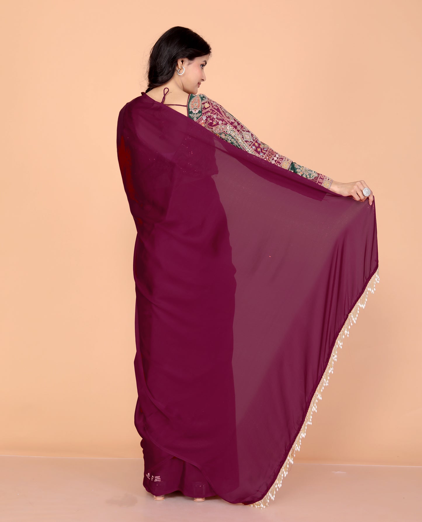 CREPE PLAIN TASSELS WORK BURGENDY SAREE BY SKFBHOLUBHAI
