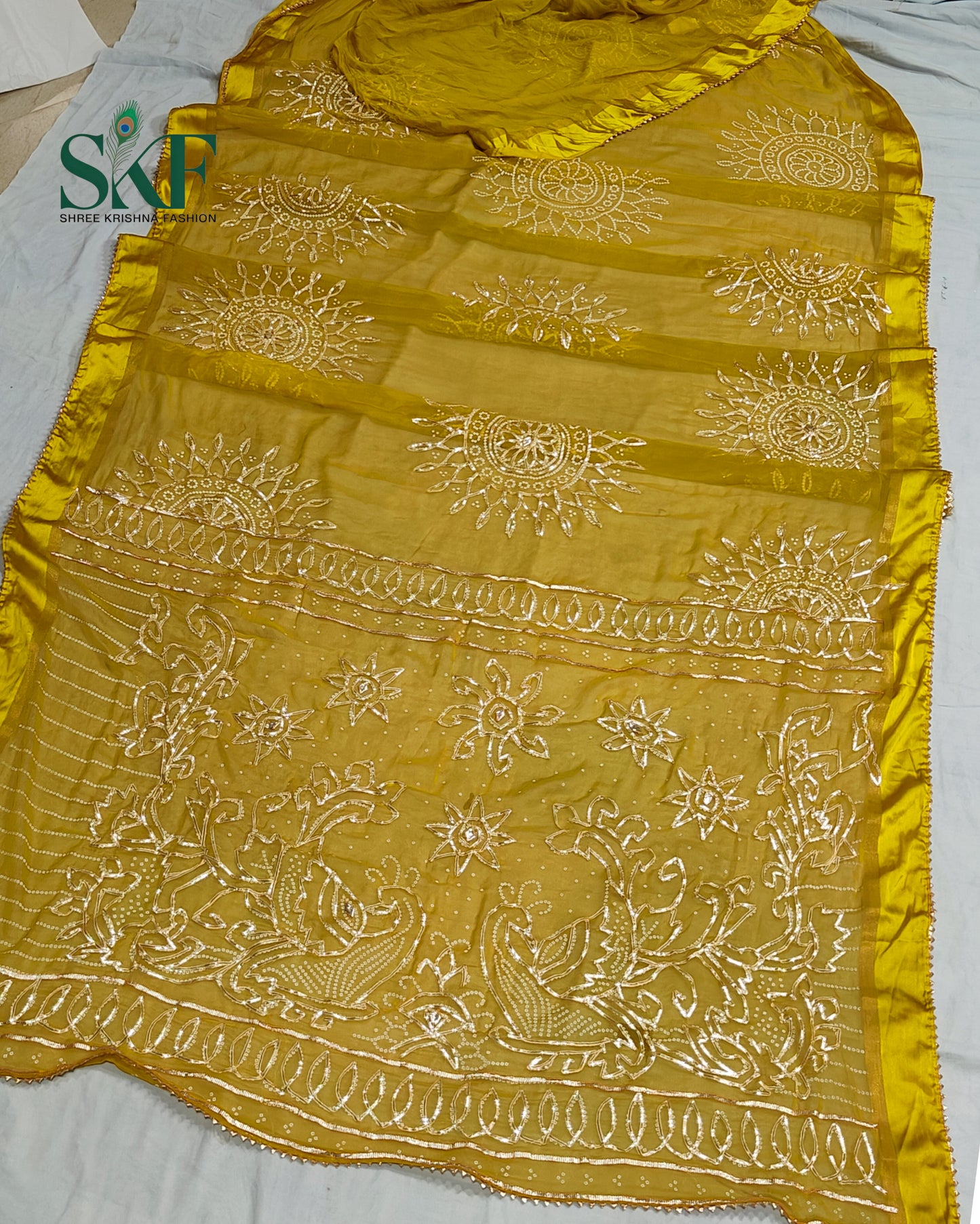 DIAMOND CHIFFON BHANDHANI KACHAGOTTA WORK MEHNDI GREEN SAREE BY SKFBHOLUBHAI