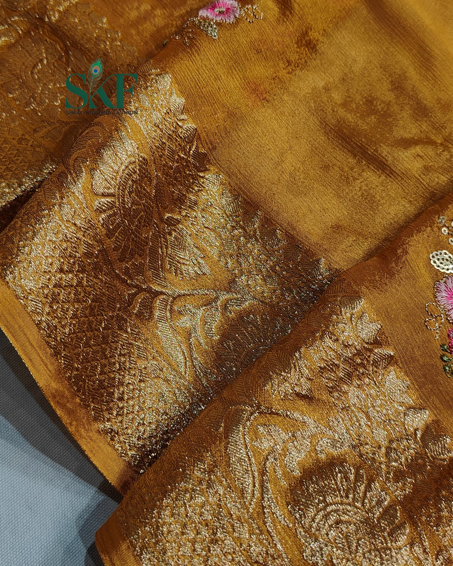 CHINON SEQUENCE EMBROIDERY WEAVING WORK MUSTARD SAREE BY SKFBHOLUBHAI