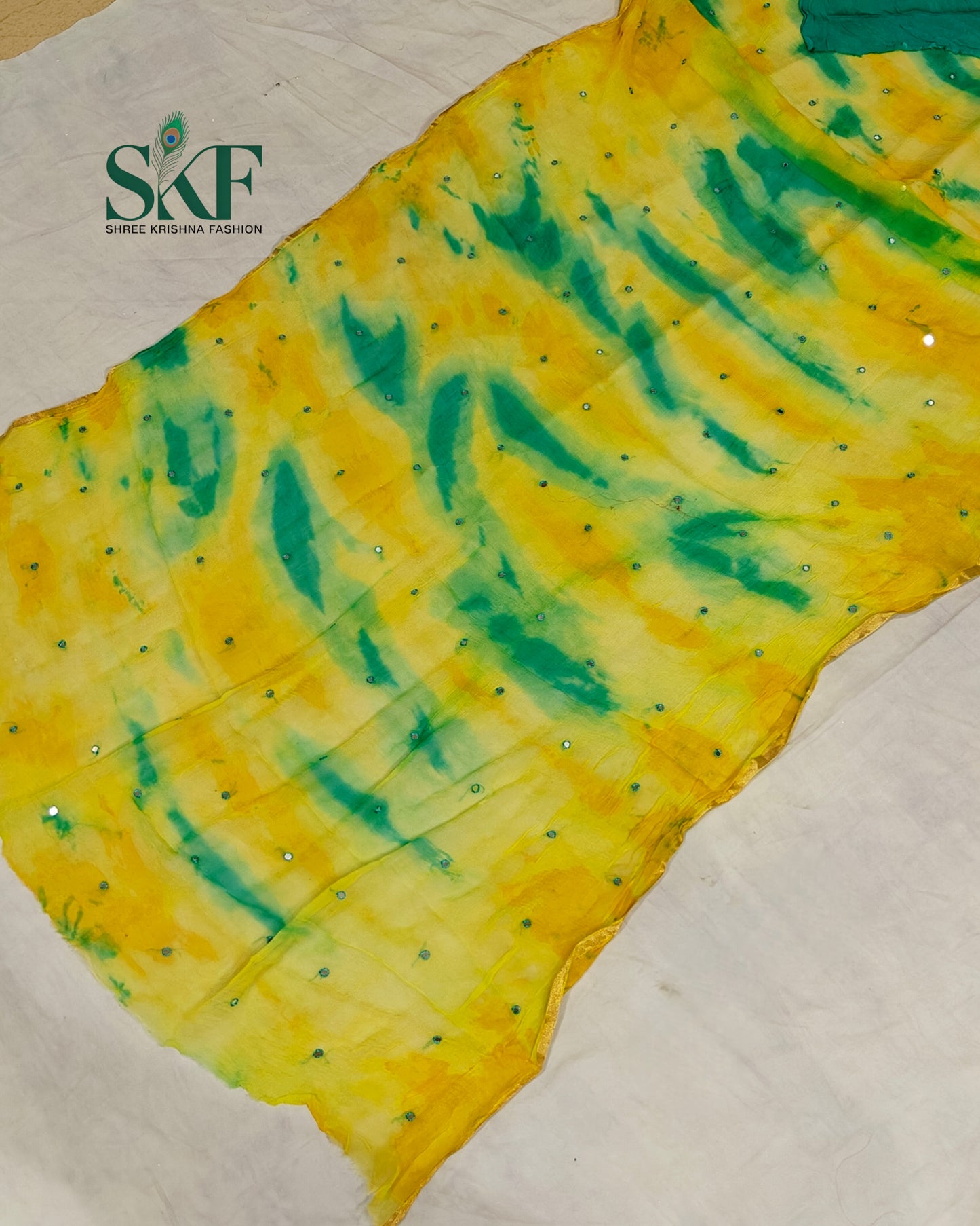 CHIFFON TIEDYE THREAD MIRROR WORK RAMAGREEN SAREE BY SKFBHOLUBHAI