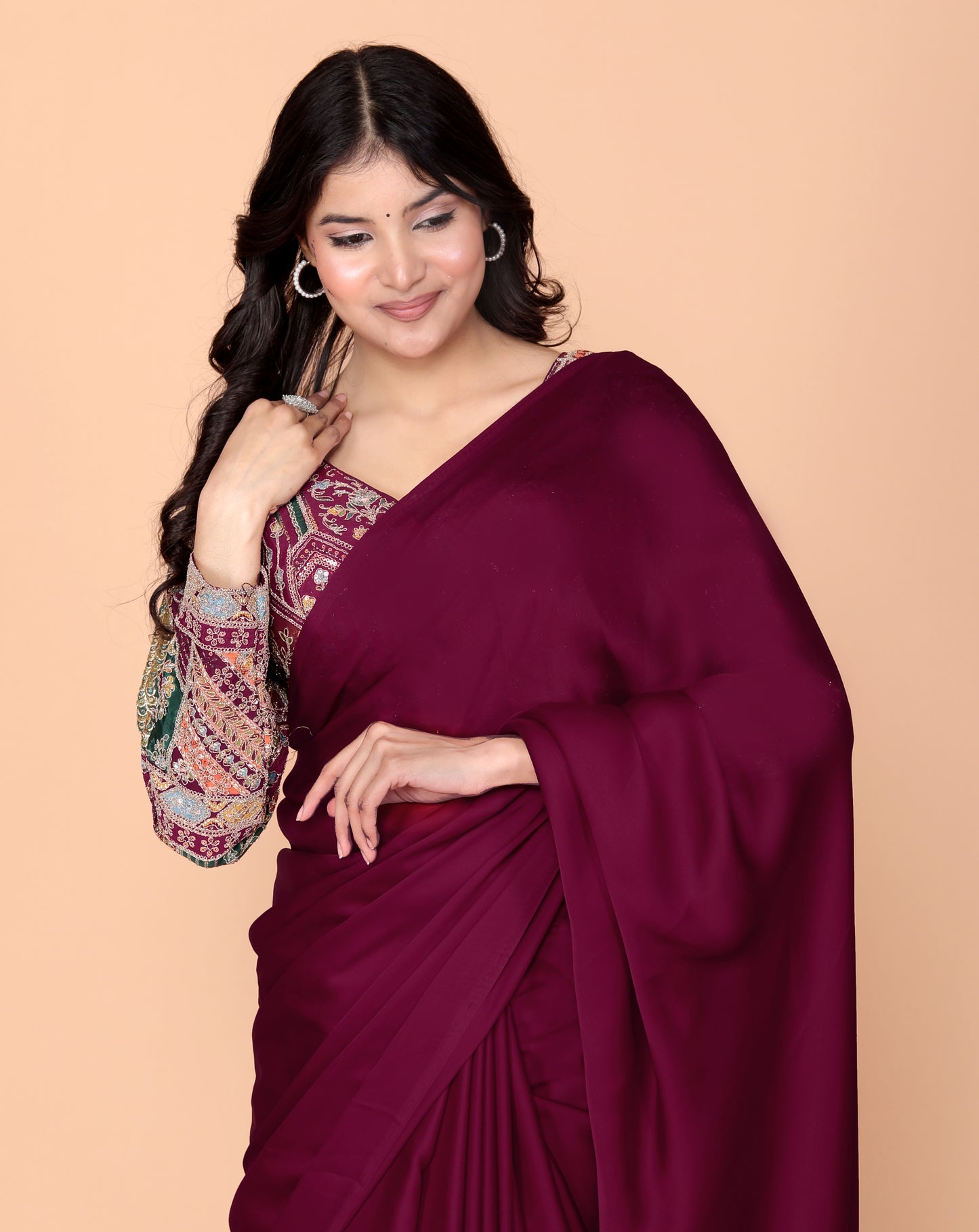 CREPE PLAIN TASSELS WORK BURGENDY SAREE BY SKFBHOLUBHAI