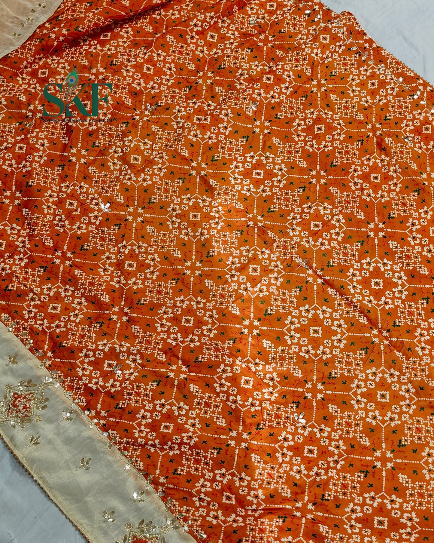 TUSSAR SILK PATOLA PRINT GOTTA HANDWORK BORDER ORANGE SAREE BY SKFBHOLUBHAI