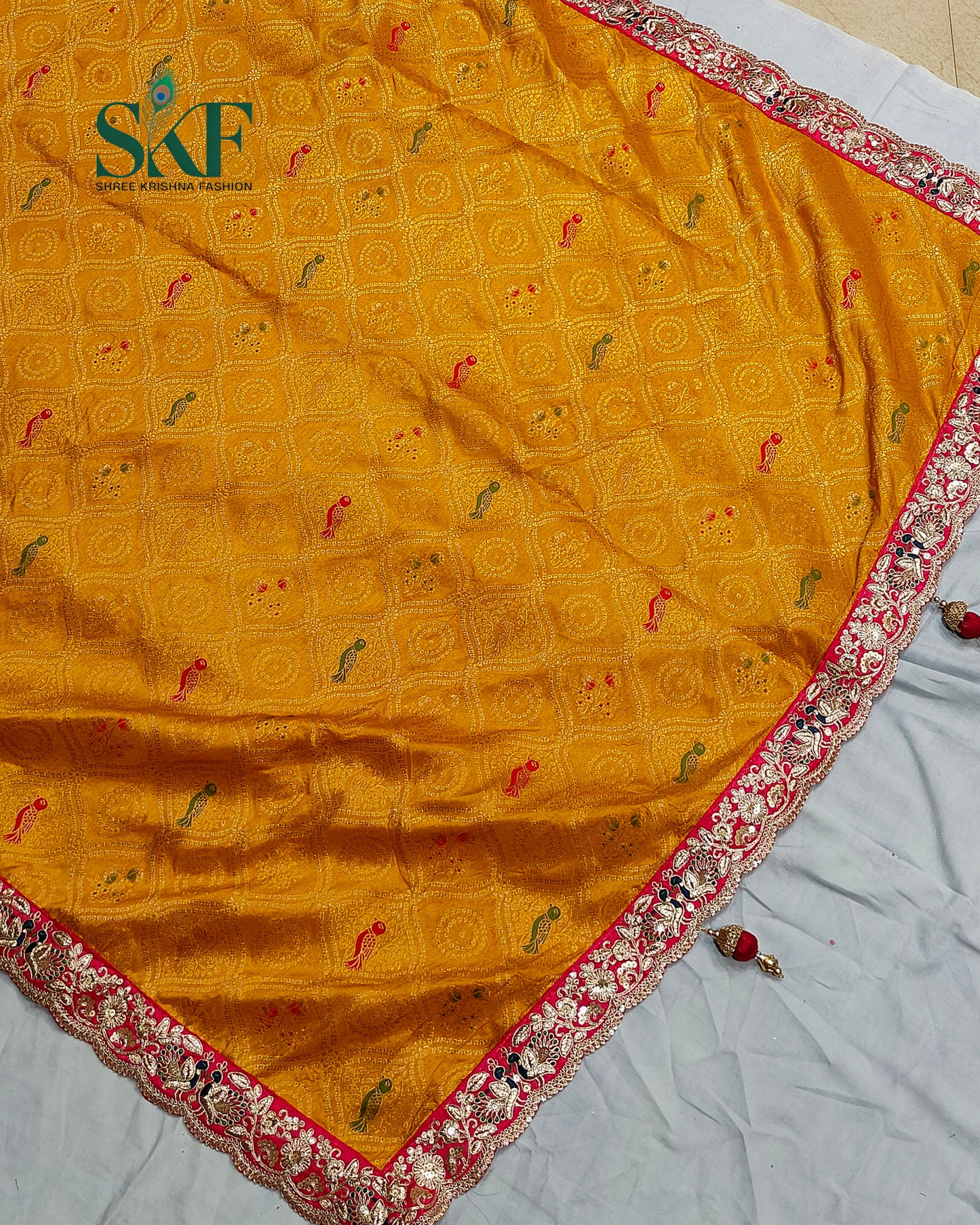 DOLA BANARSI WEAVING BHANDHANI HEAVY WORK BORDER YELLOW SAREE BY SKFBHOLUBHAI