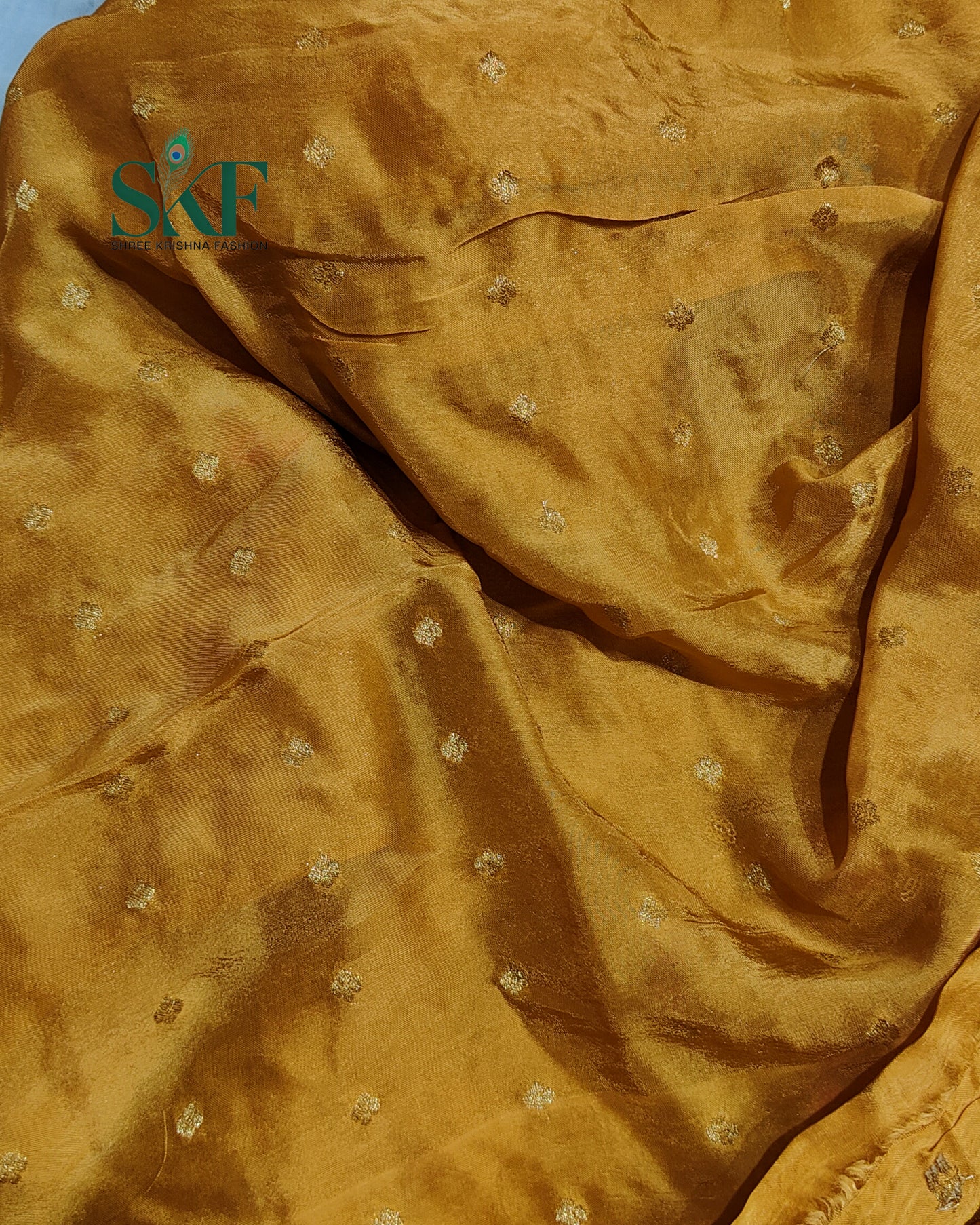 CHINON SEQUENCE EMBROIDERY WEAVING WORK MUSTARD SAREE BY SKFBHOLUBHAI