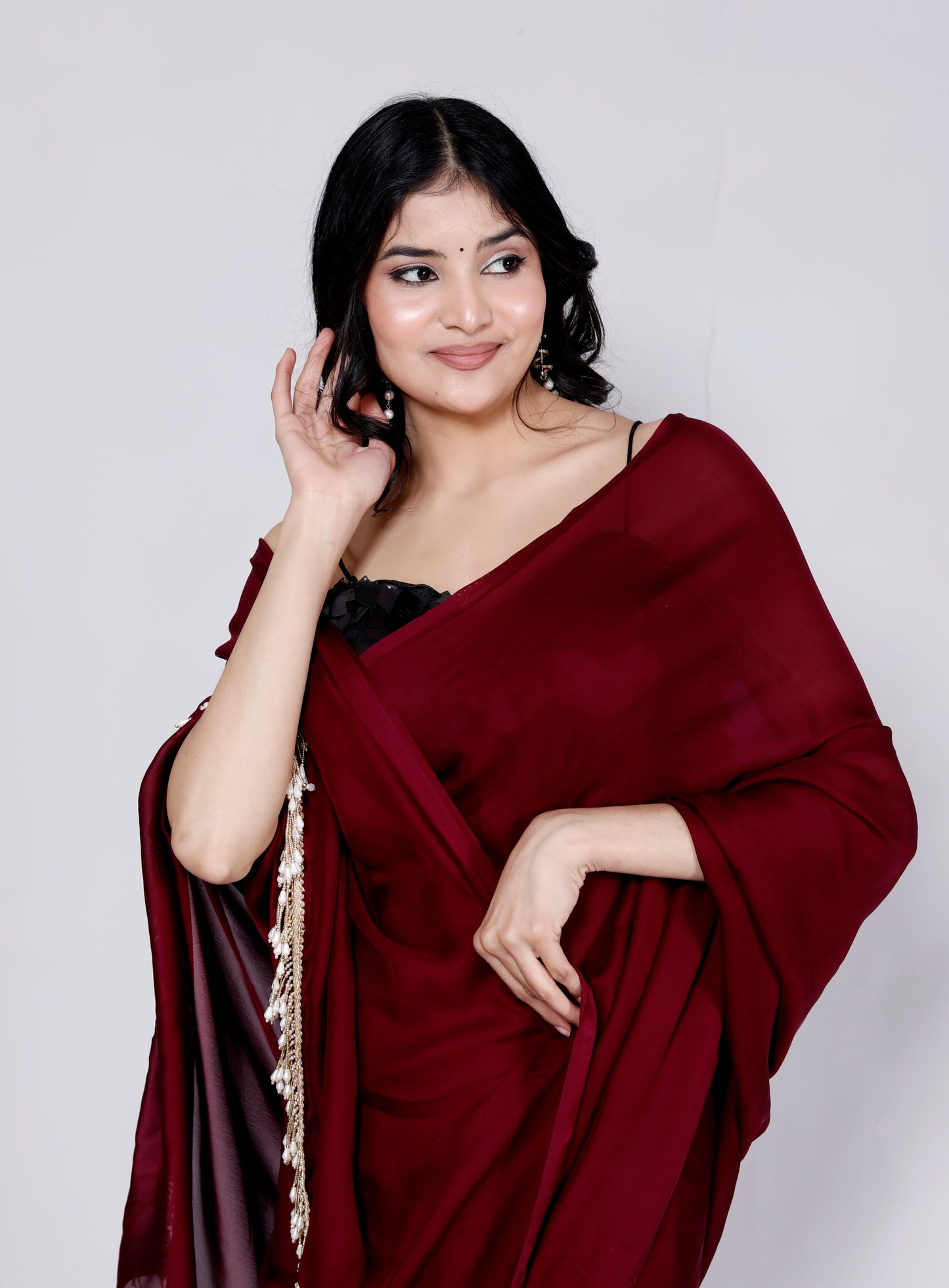 CREPE PLAIN TASSELS WORK MAHROON SAREE BY SKFBHOLUBHAI