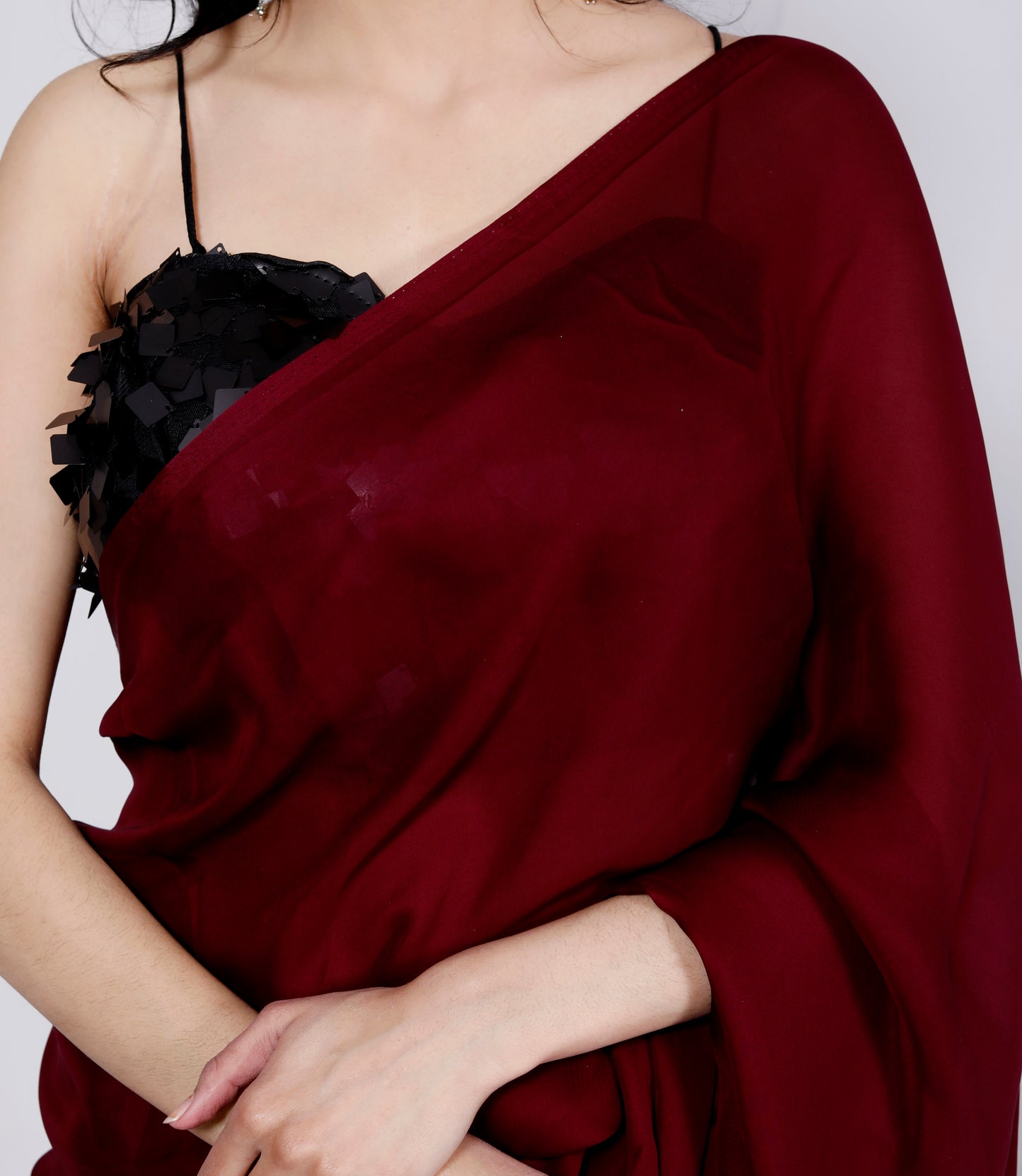 CREPE PLAIN TASSELS WORK MAHROON SAREE BY SKFBHOLUBHAI