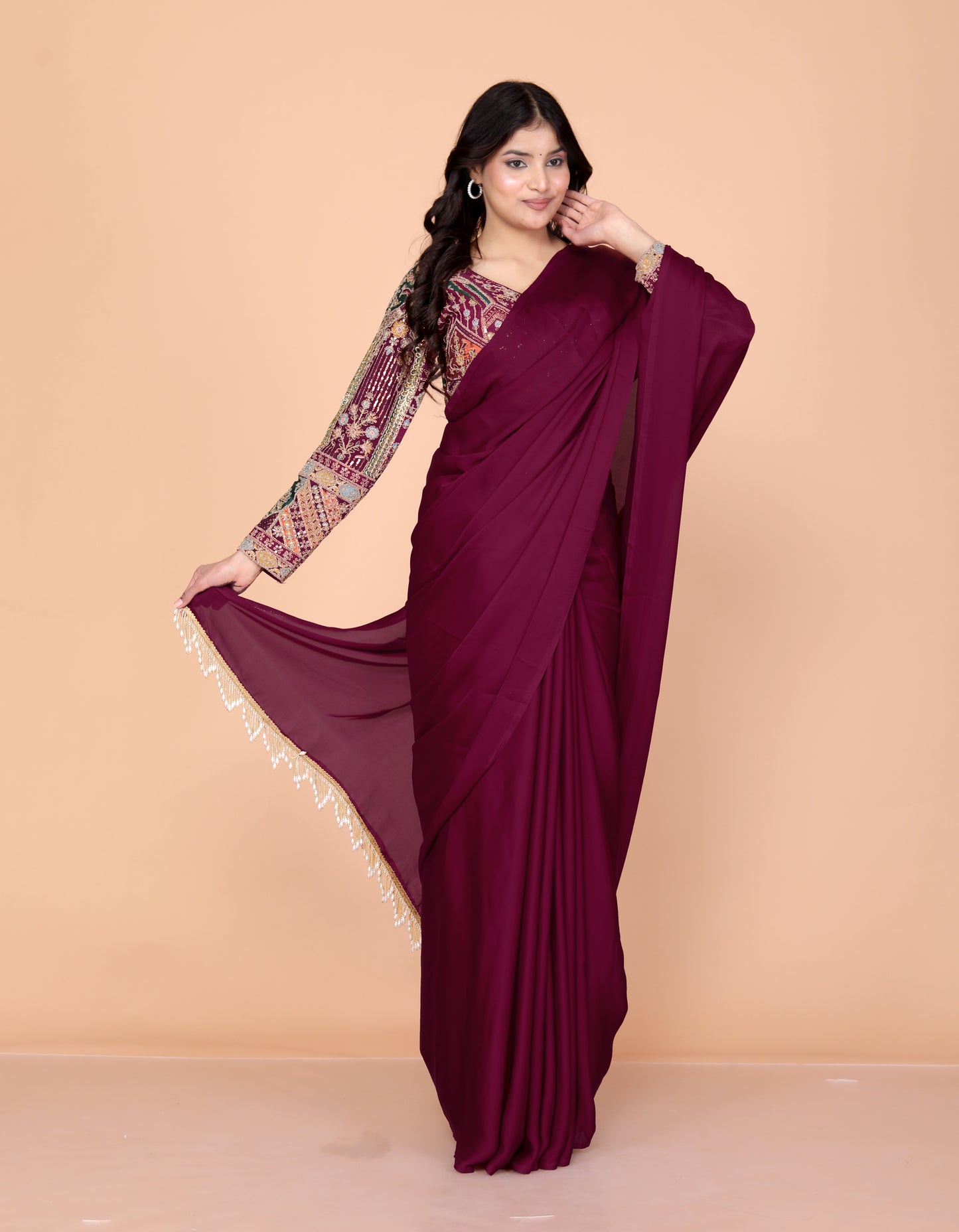 CREPE PLAIN TASSELS WORK BURGENDY SAREE BY SKFBHOLUBHAI