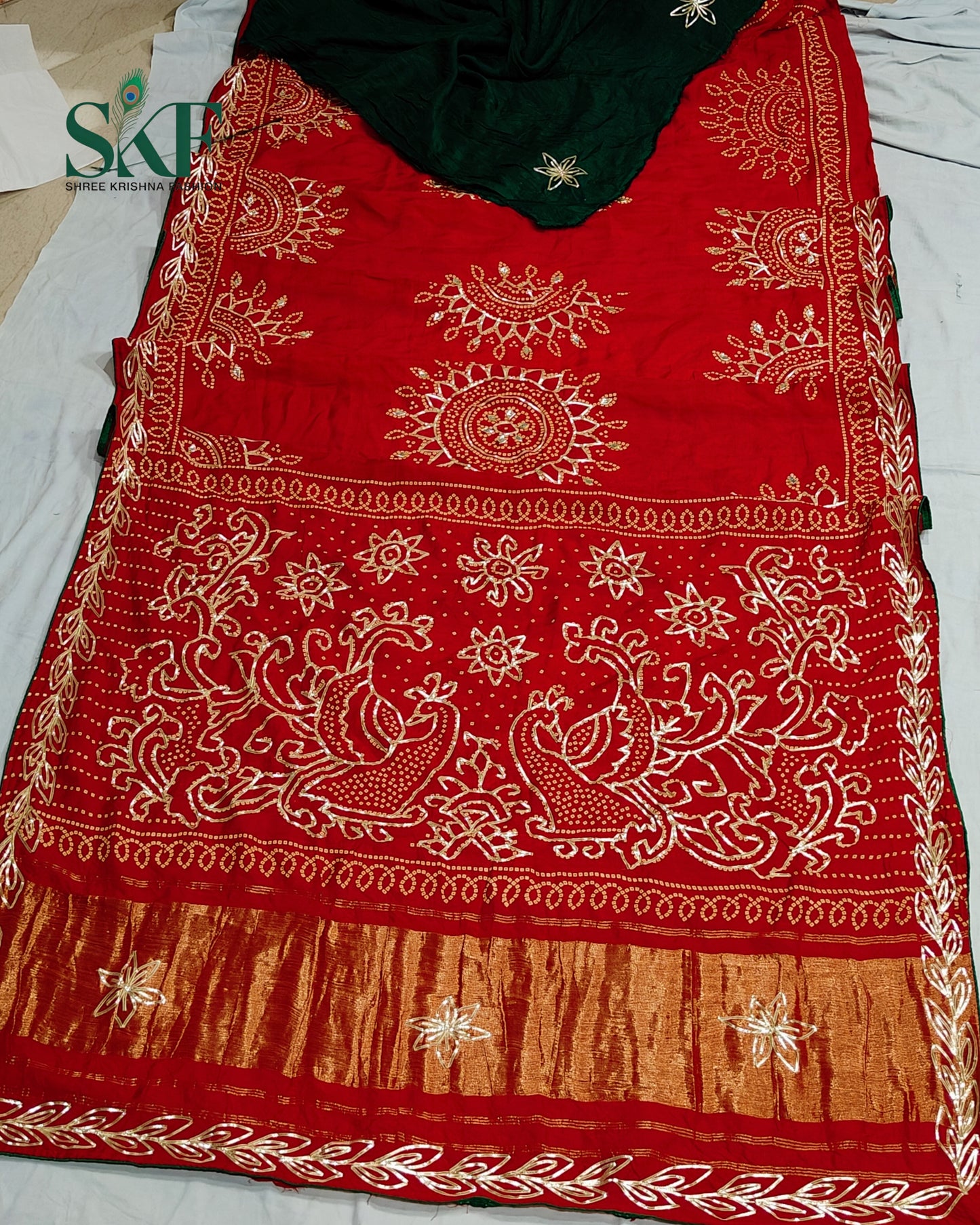 MODAL SILK BHANDHANI KACHAGOTTA WORK RED SAREE BY SKFBHOLUBHAI
