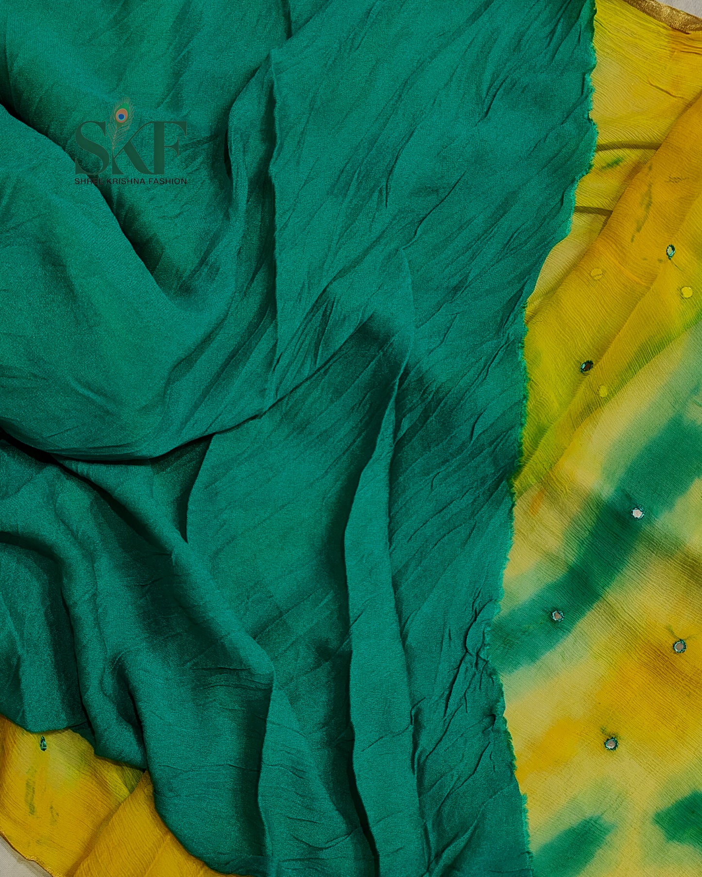 CHIFFON TIEDYE THREAD MIRROR WORK RAMAGREEN SAREE BY SKFBHOLUBHAI