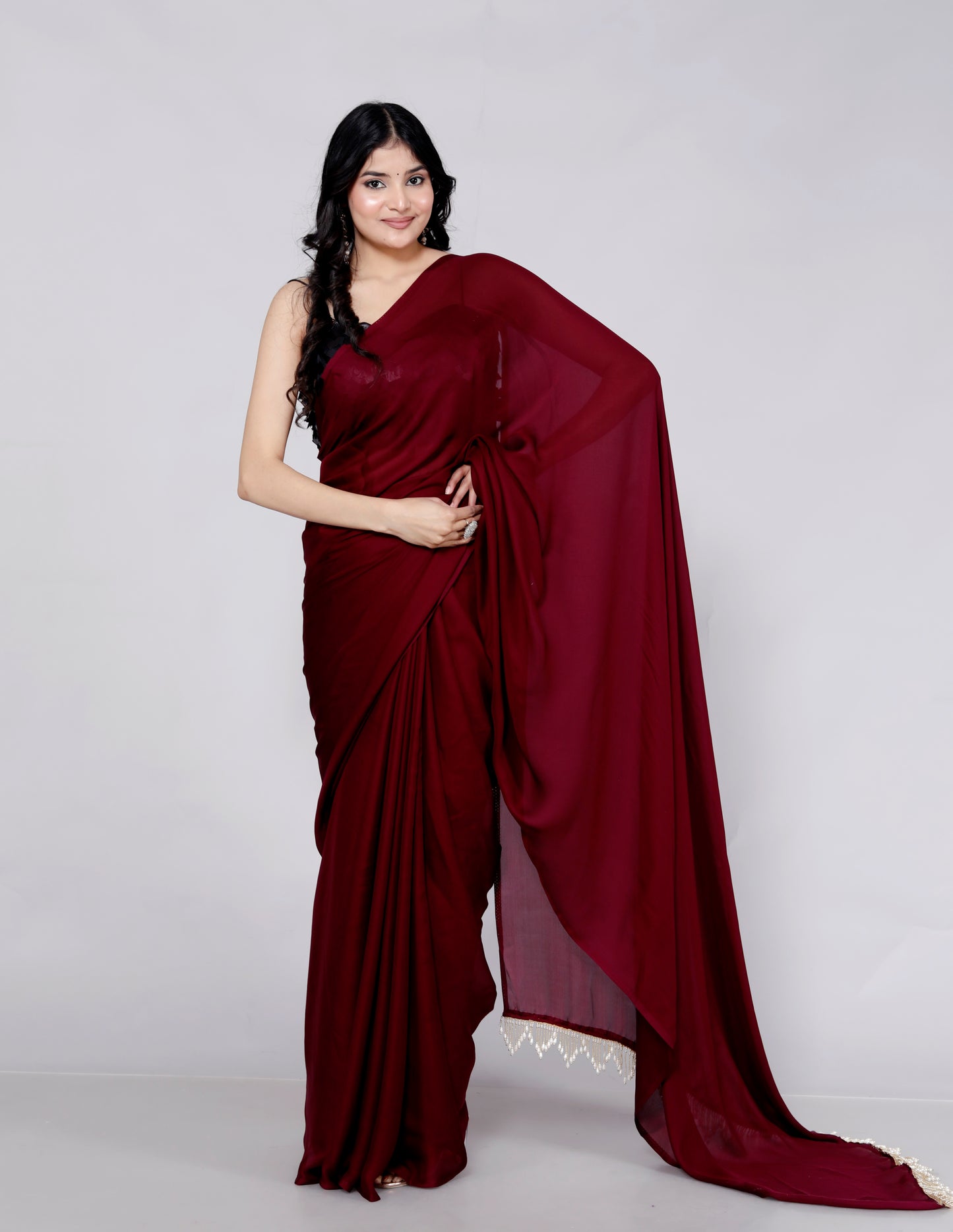 CREPE PLAIN TASSELS WORK MAHROON SAREE BY SKFBHOLUBHAI