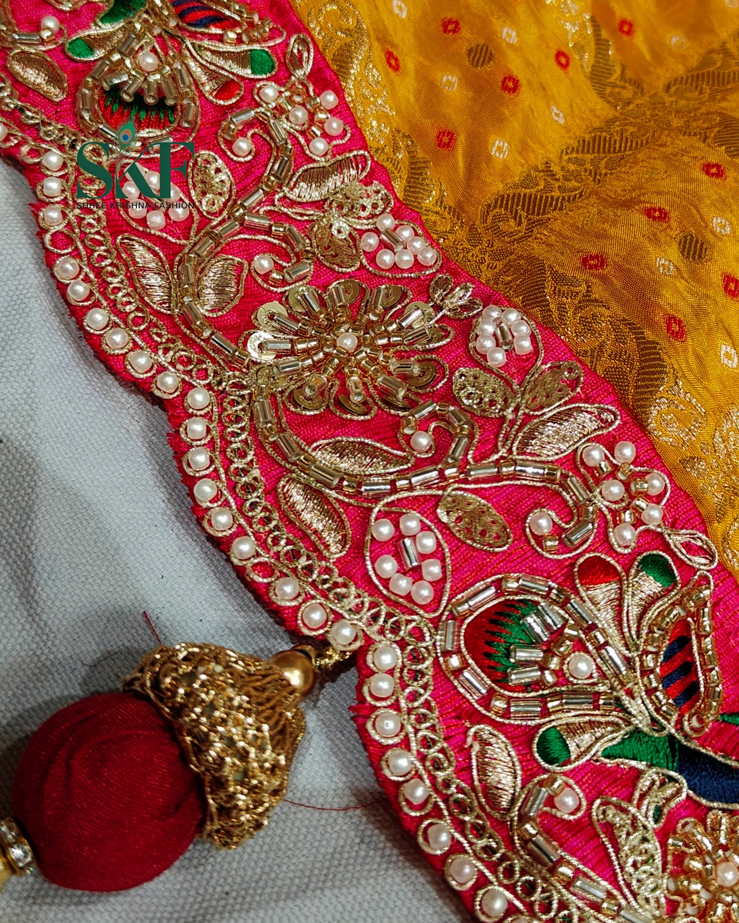 KHADI NEEM JARI GEORGETTE GHATCHOLA BHANDHANI HEAVY WORK BORDER YELLOW SAREE BY SKFBHOLUBHAI