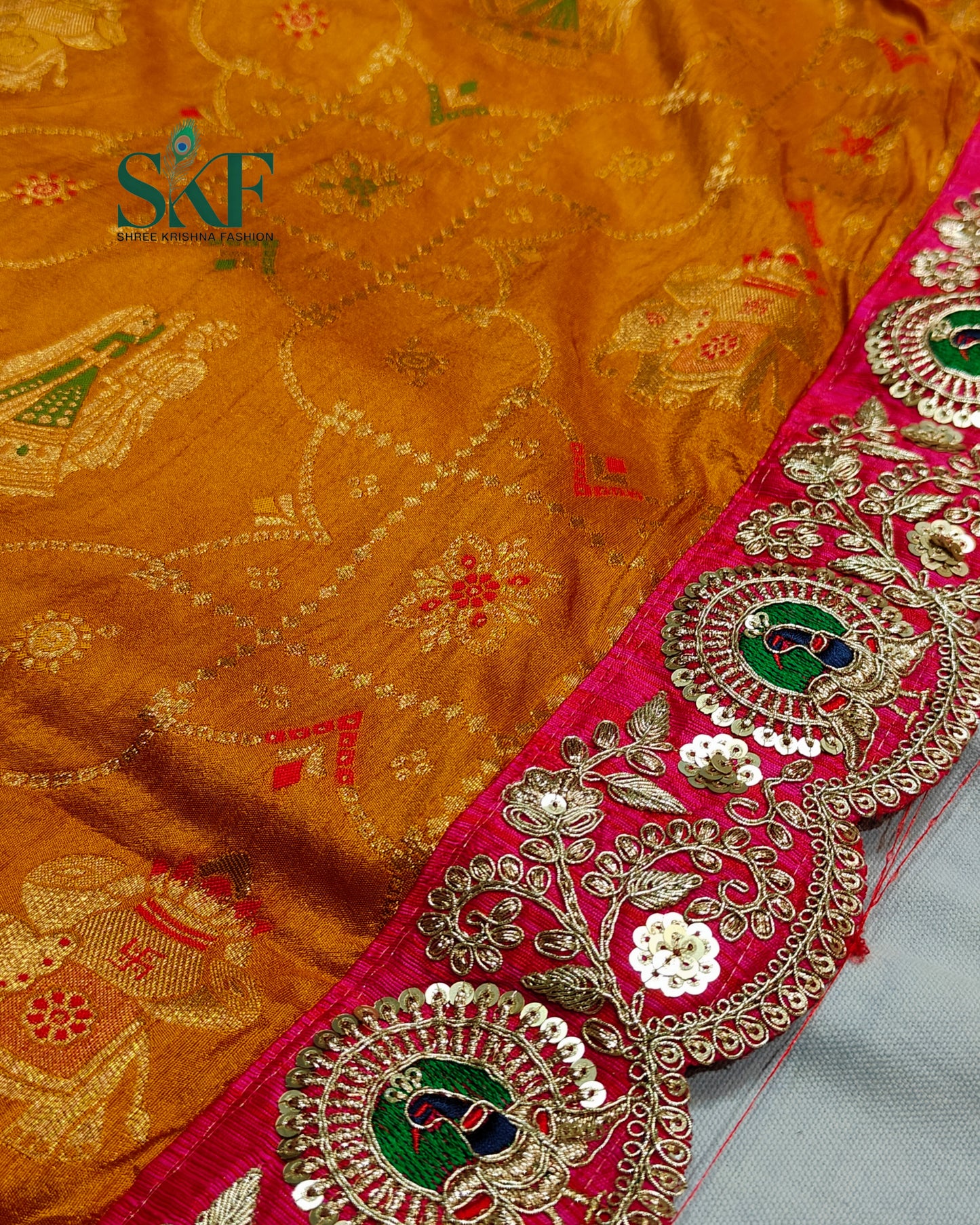 DOLA BANARSI MOTIF WEAVING HEAVY WORK BORDER YELLOW MUSTURD SAREE BY SKFBHOLUBHAI