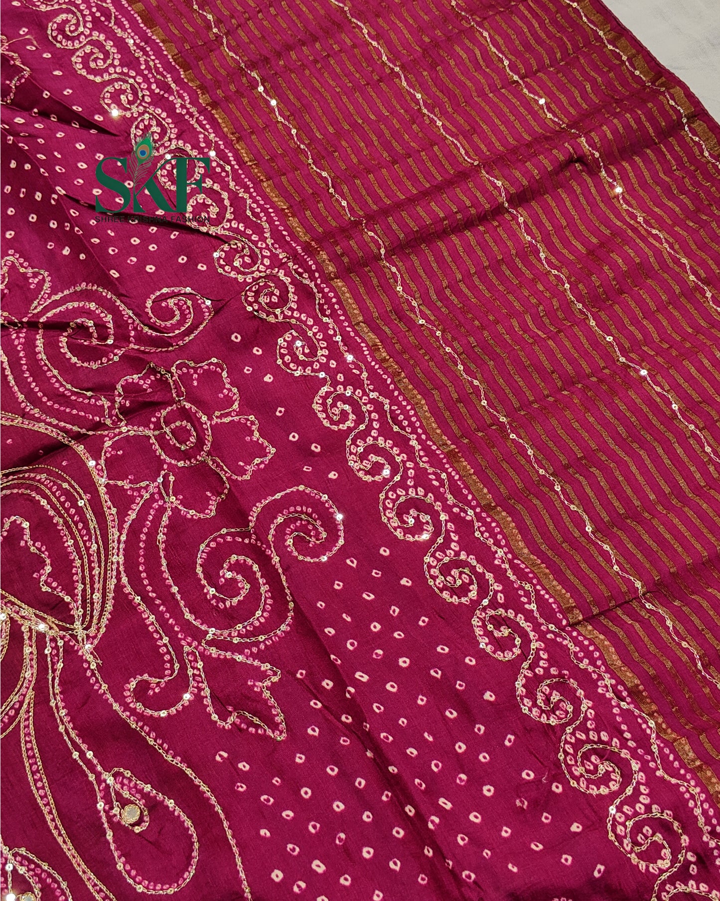 HO SILK BHANDHANI PEACOCK MOTIF AARI AND SEQUENCE WORK WINE SAREE BY SKFBHOLUBHAI