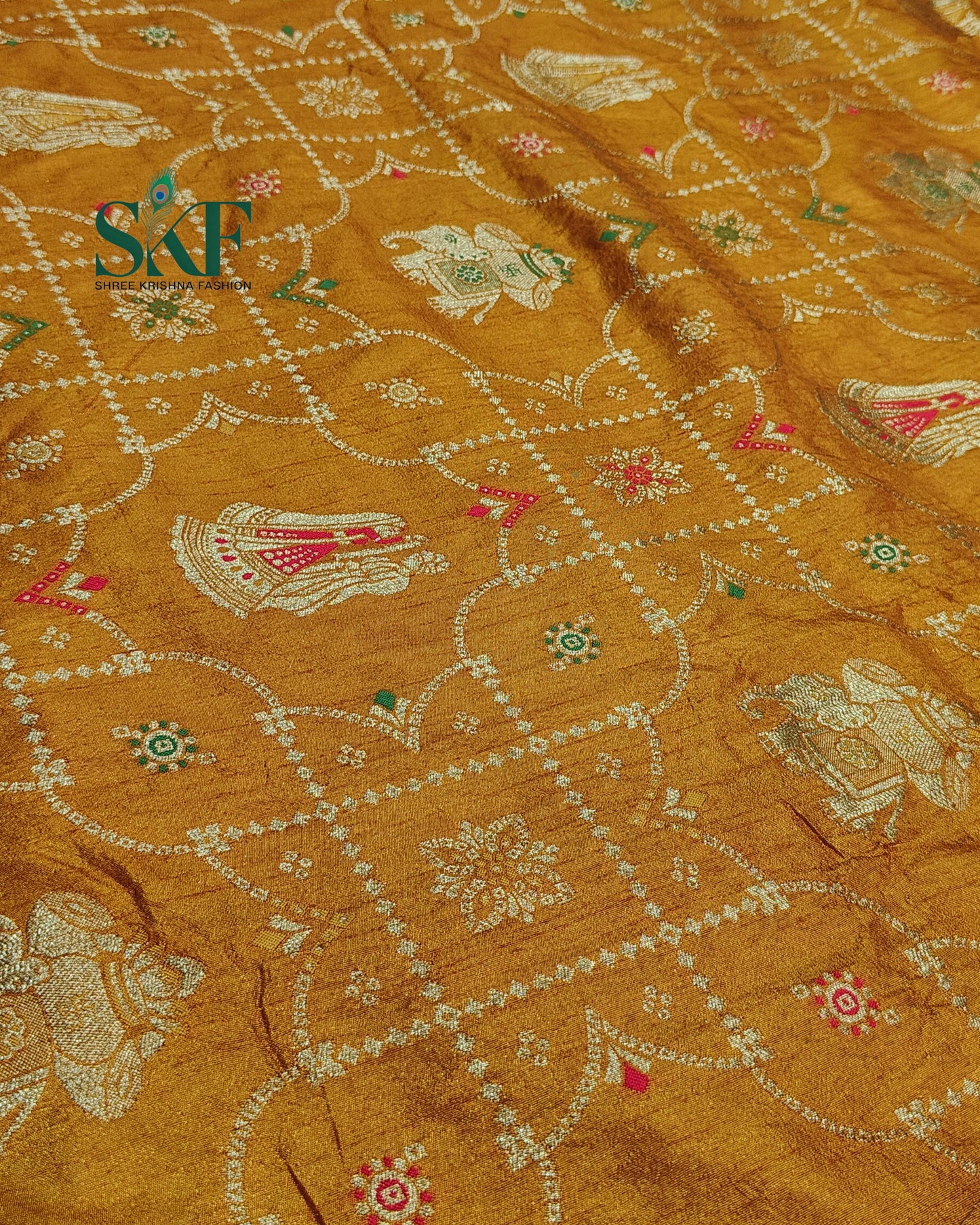DOLA BANARSI MOTIF WEAVING HEAVY WORK BORDER YELLOW MUSTURD SAREE BY SKFBHOLUBHAI