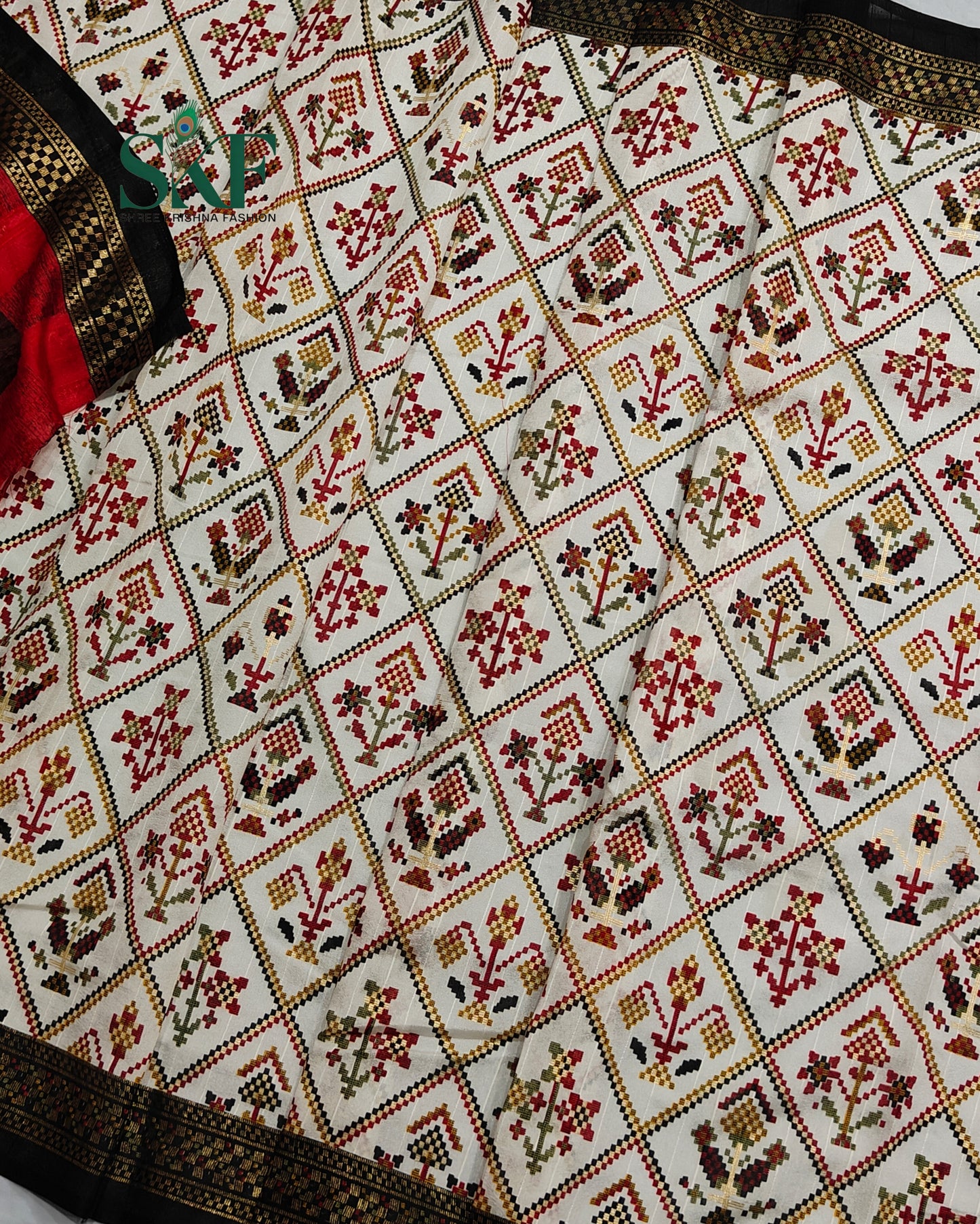 MAURA SILK PATOLA FOIL PRINT WEAVING IVORY SAREE BY SKFBHOLUBHAI