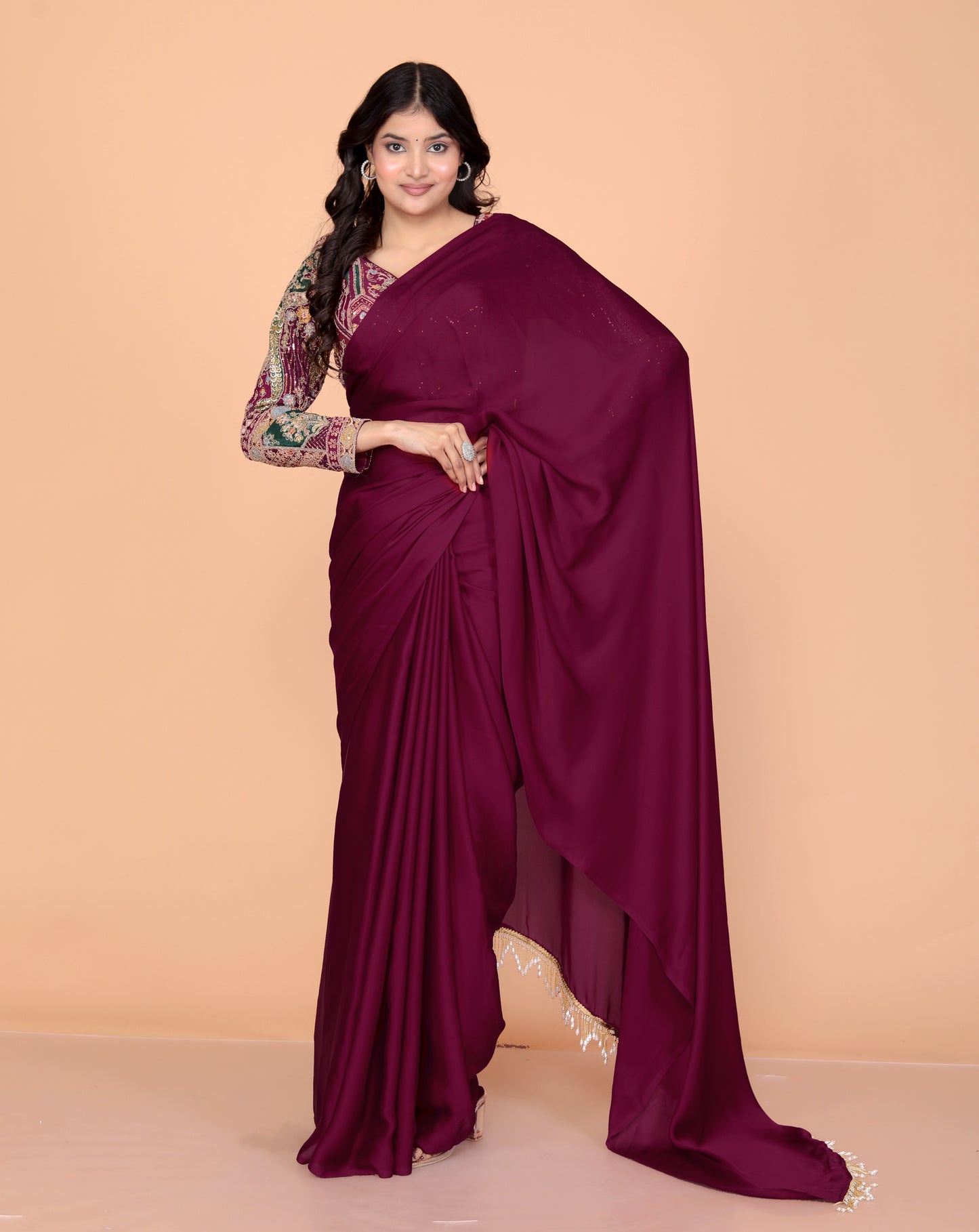 CREPE PLAIN TASSELS WORK BURGENDY SAREE BY SKFBHOLUBHAI