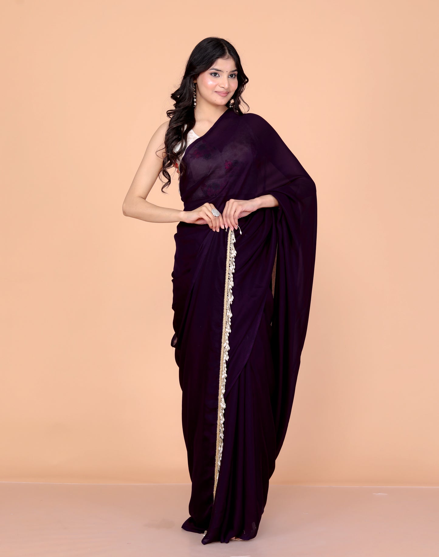 CREPE PLAIN TASSELS WORK PURPLE SAREE BY SKFBHOLUBHAI