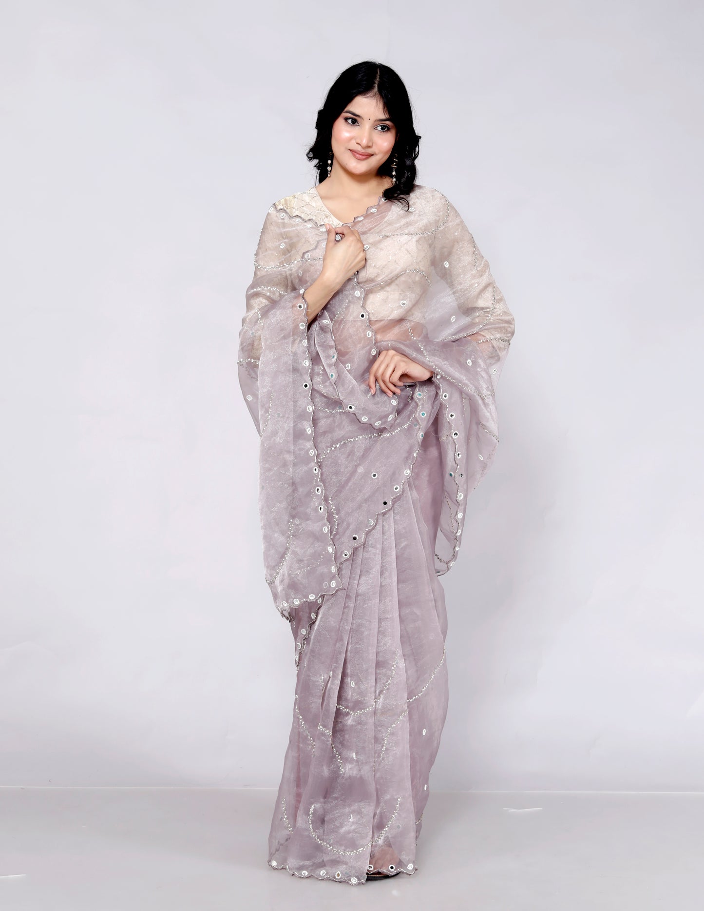 GLOSSY ORGANZA MIRROR AND JERKEN HANDWORK LILAC SAREE BY SKFBHOLUBHAI