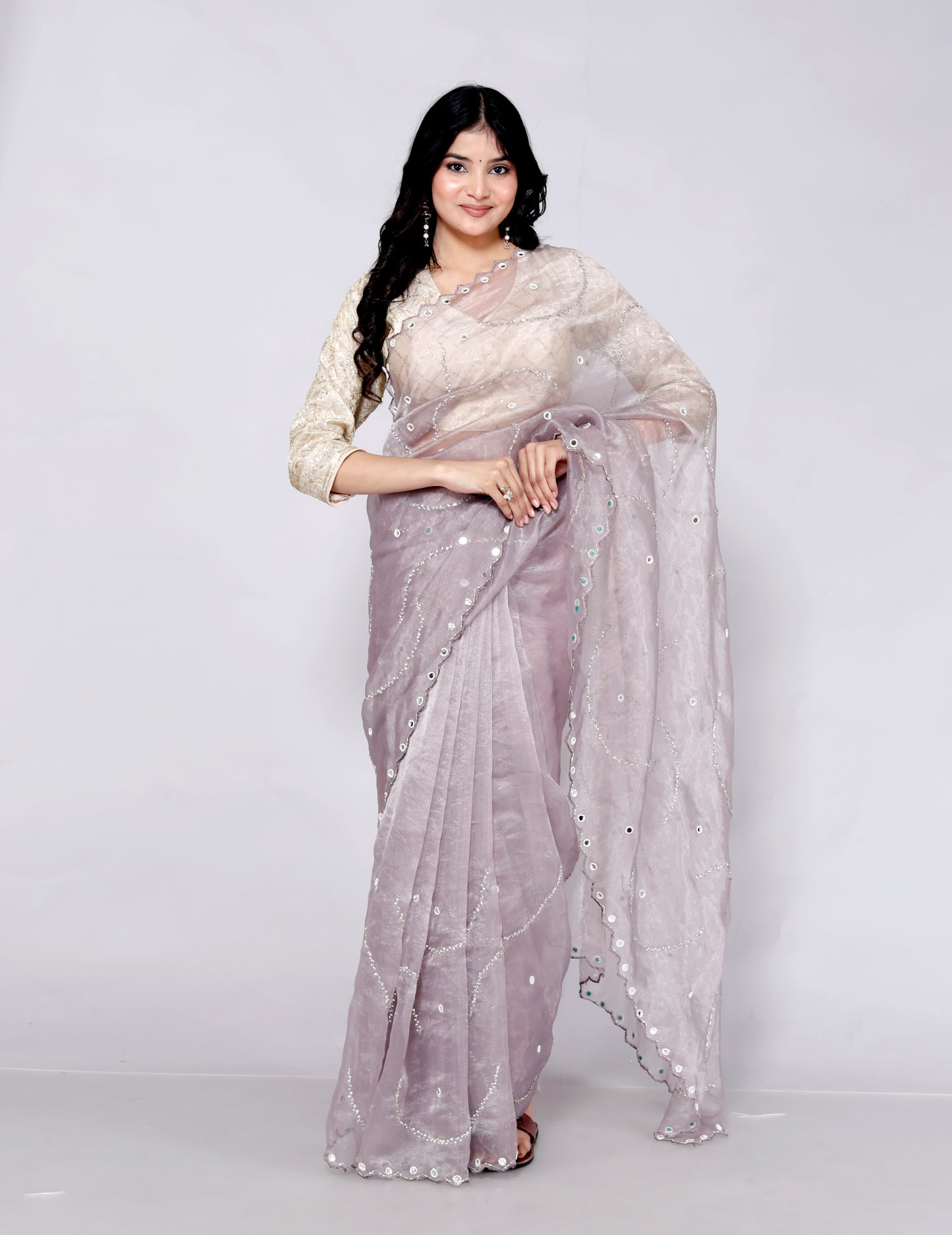 GLOSSY ORGANZA MIRROR AND JERKEN HANDWORK LILAC SAREE BY SKFBHOLUBHAI