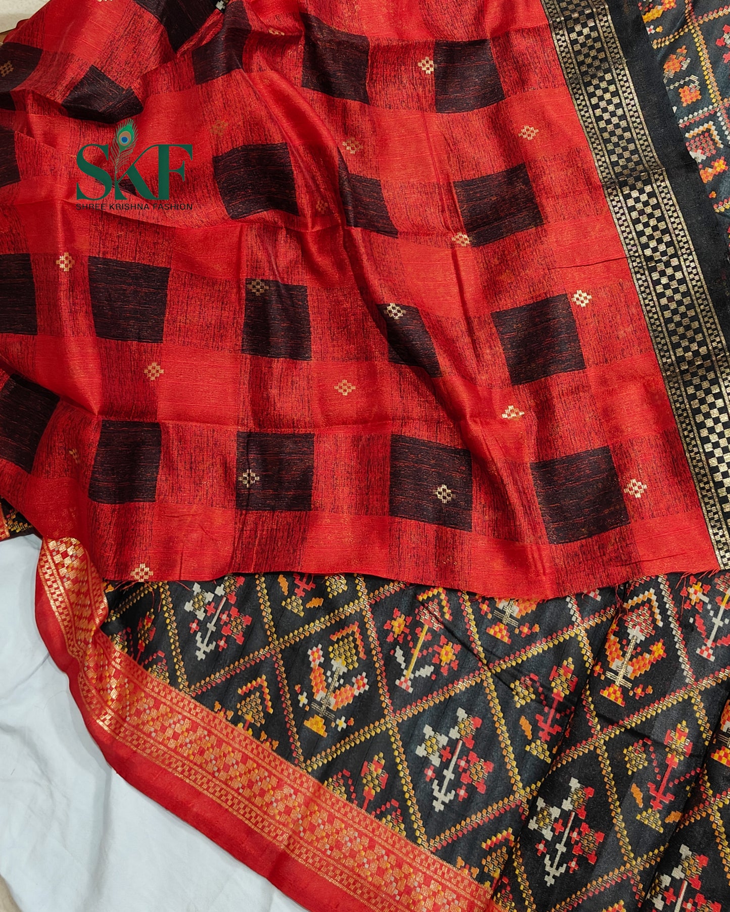MAURA SILK PATOLA FOIL PRINT WEAVING BLACK SAREE BY SKFBHOLUBHAI