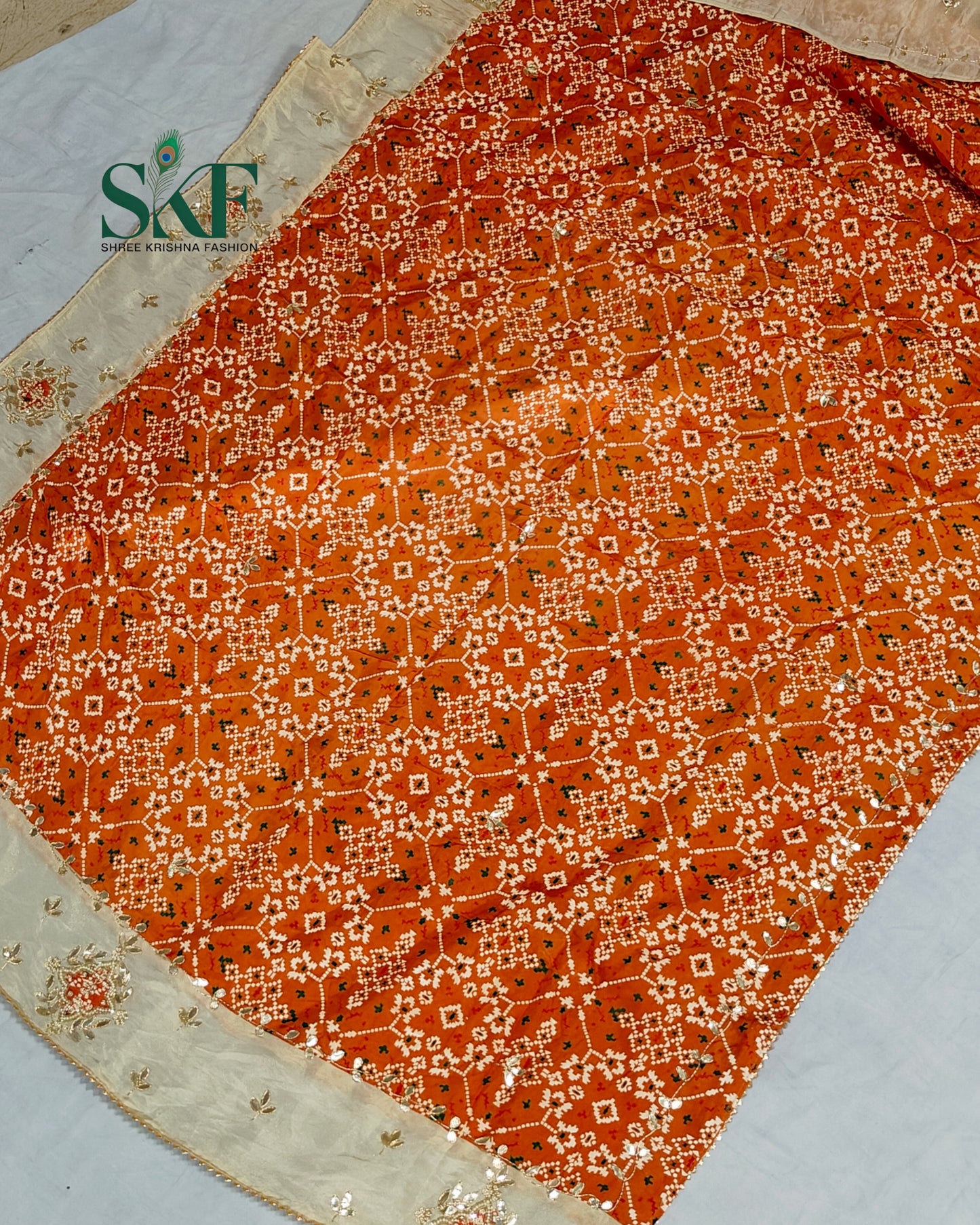 TUSSAR SILK PATOLA PRINT GOTTA HANDWORK BORDER ORANGE SAREE BY SKFBHOLUBHAI