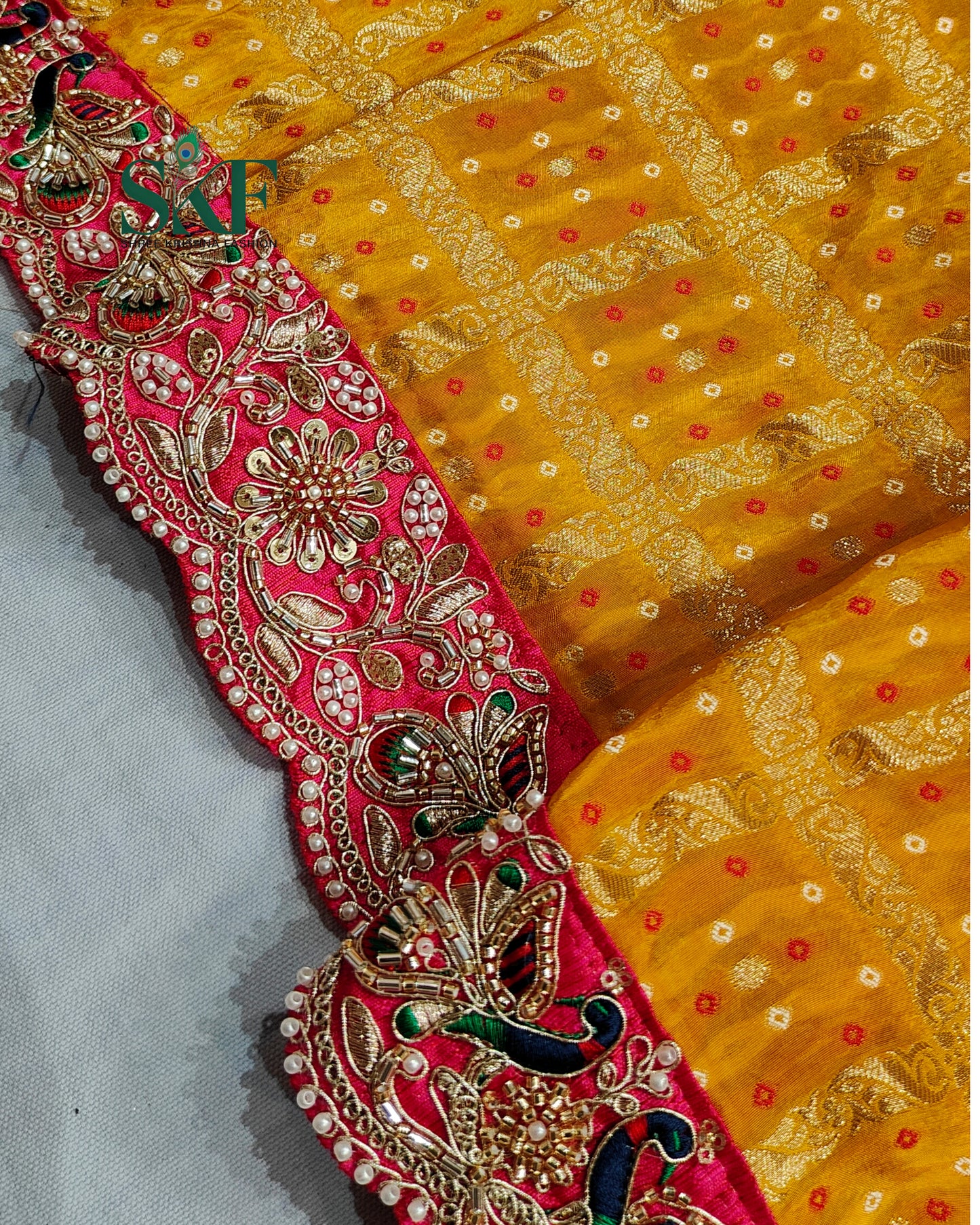 KHADI NEEM JARI GEORGETTE GHATCHOLA BHANDHANI HEAVY WORK BORDER YELLOW SAREE BY SKFBHOLUBHAI