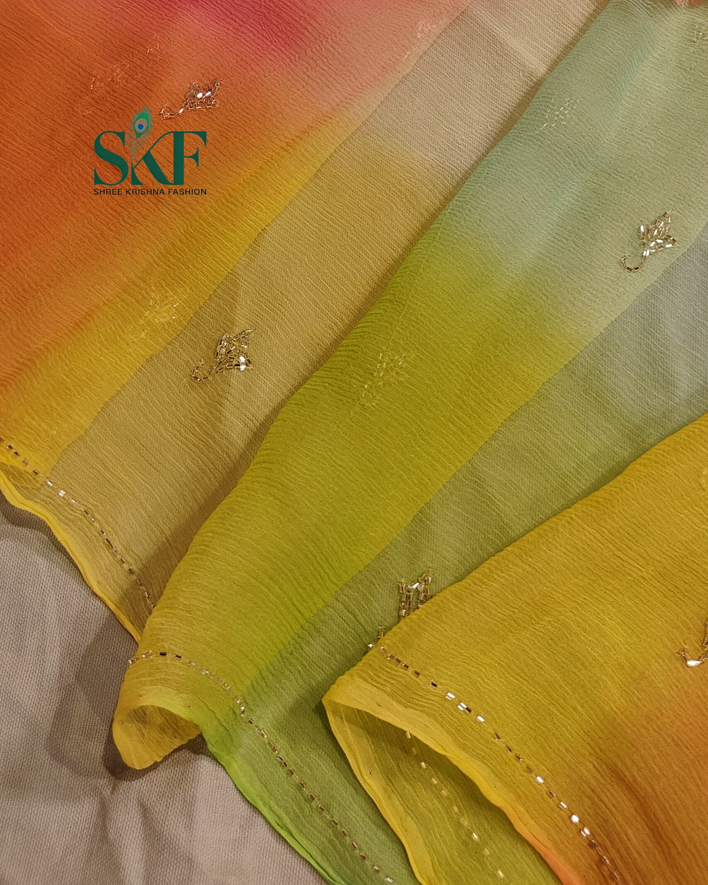 CHIFFON OMBRE DYE KARDANA HANDWORK BUTTY MULTICOLOUR SAREE BY SKFBHOLUBHAI