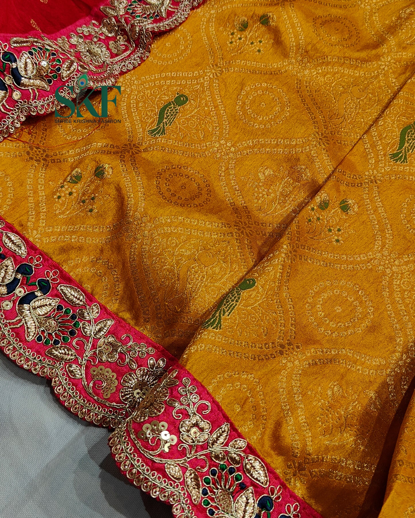 DOLA BANARSI WEAVING BHANDHANI HEAVY WORK BORDER YELLOW SAREE BY SKFBHOLUBHAI