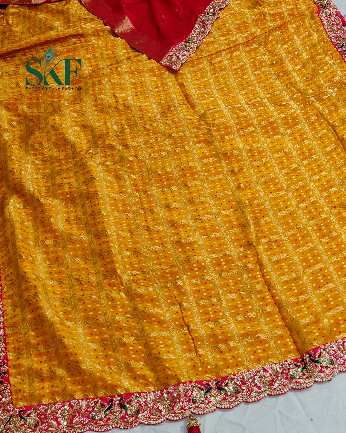 KHADI NEEM JARI GEORGETTE GHATCHOLA BHANDHANI HEAVY WORK BORDER YELLOW SAREE BY SKFBHOLUBHAI