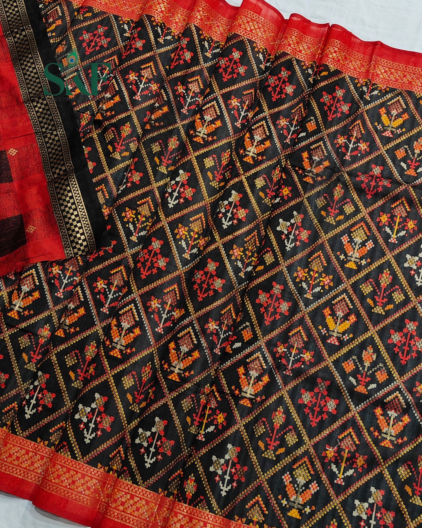 MAURA SILK PATOLA FOIL PRINT WEAVING BLACK SAREE BY SKFBHOLUBHAI