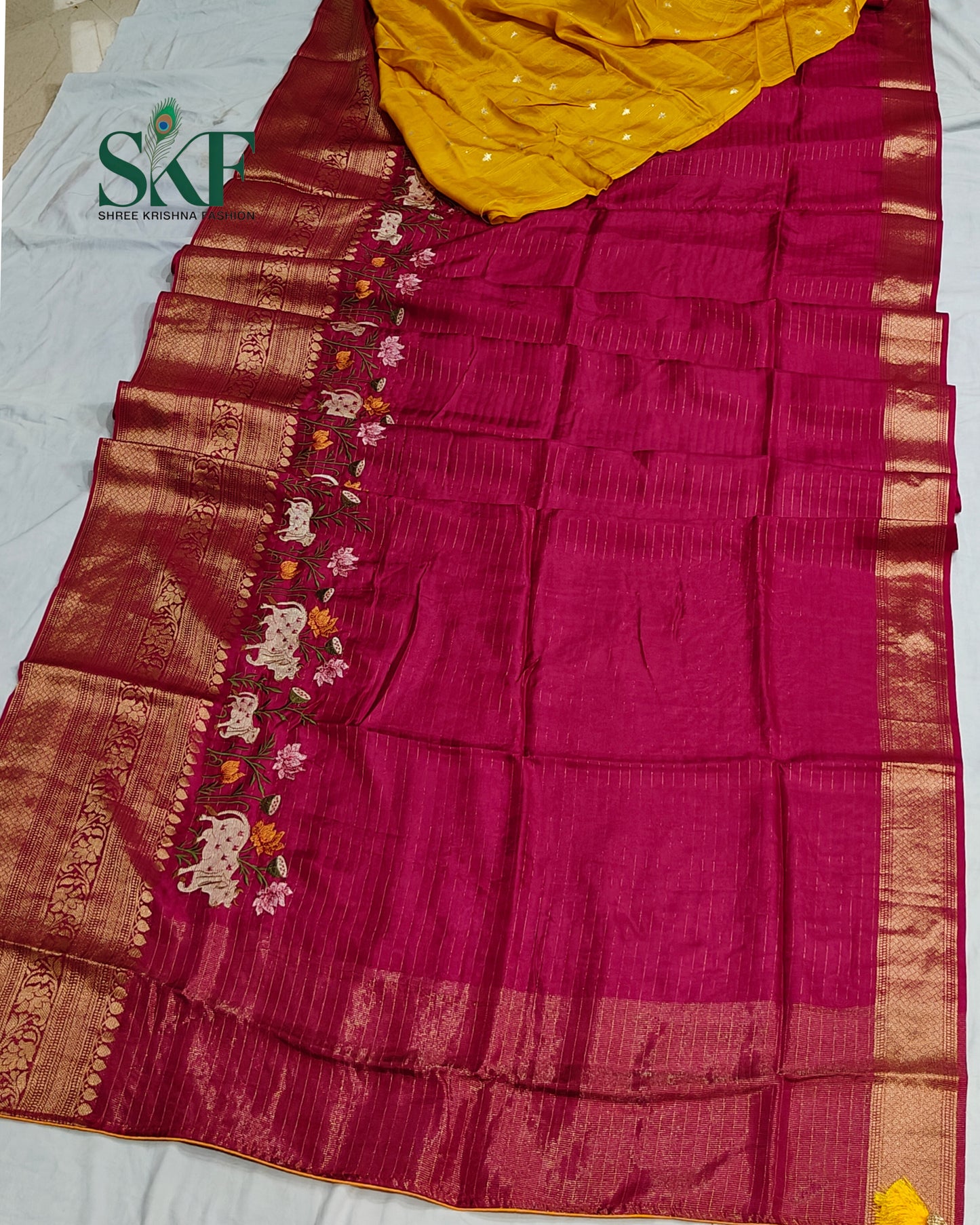 DOLA SILK MOTIF EMBROIDERY PANEL WEAVING BORDER WORK BURGENDY SAREE BY SKFBHOLUBHAI