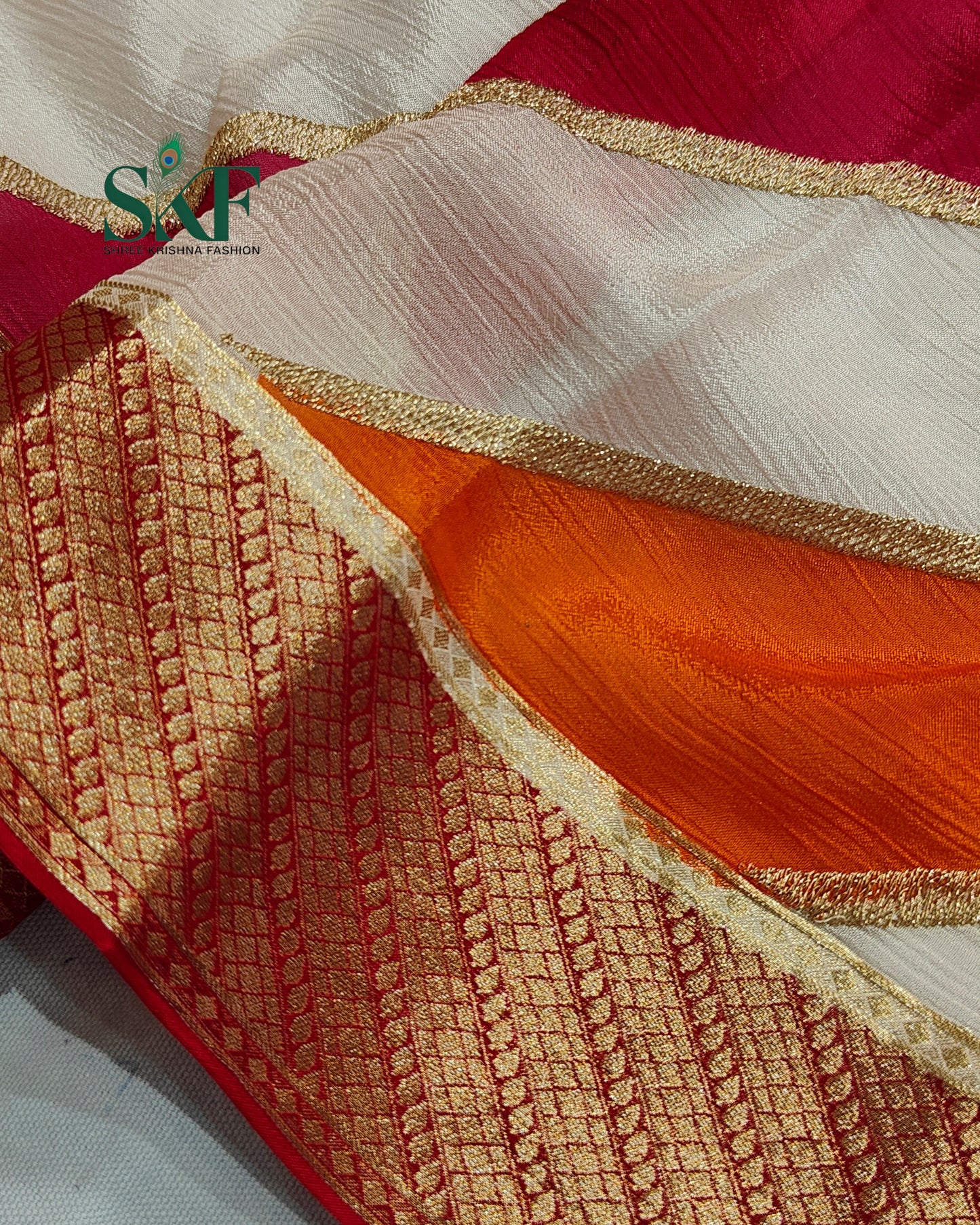 CHINON LEHRIYA EMBROIDERY WEAVING WORK BORDER MULTICOLOUR SAREE BY SKFBHOLUBHAI