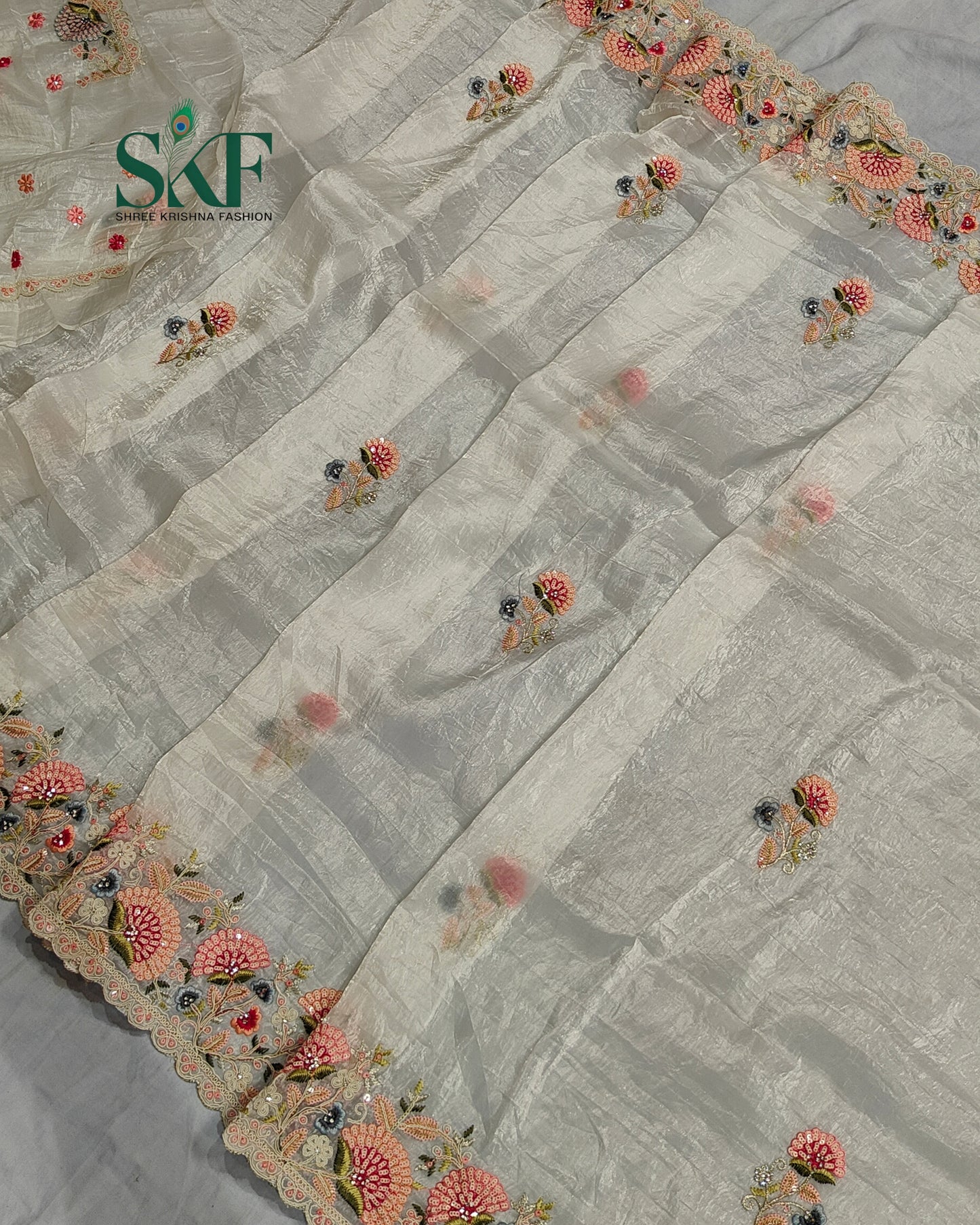 CRUSH TISSUE SIPPI SEQUENCE EMBROIDERY WORK IVORY SAREE BY SKFBHOLUBHAI