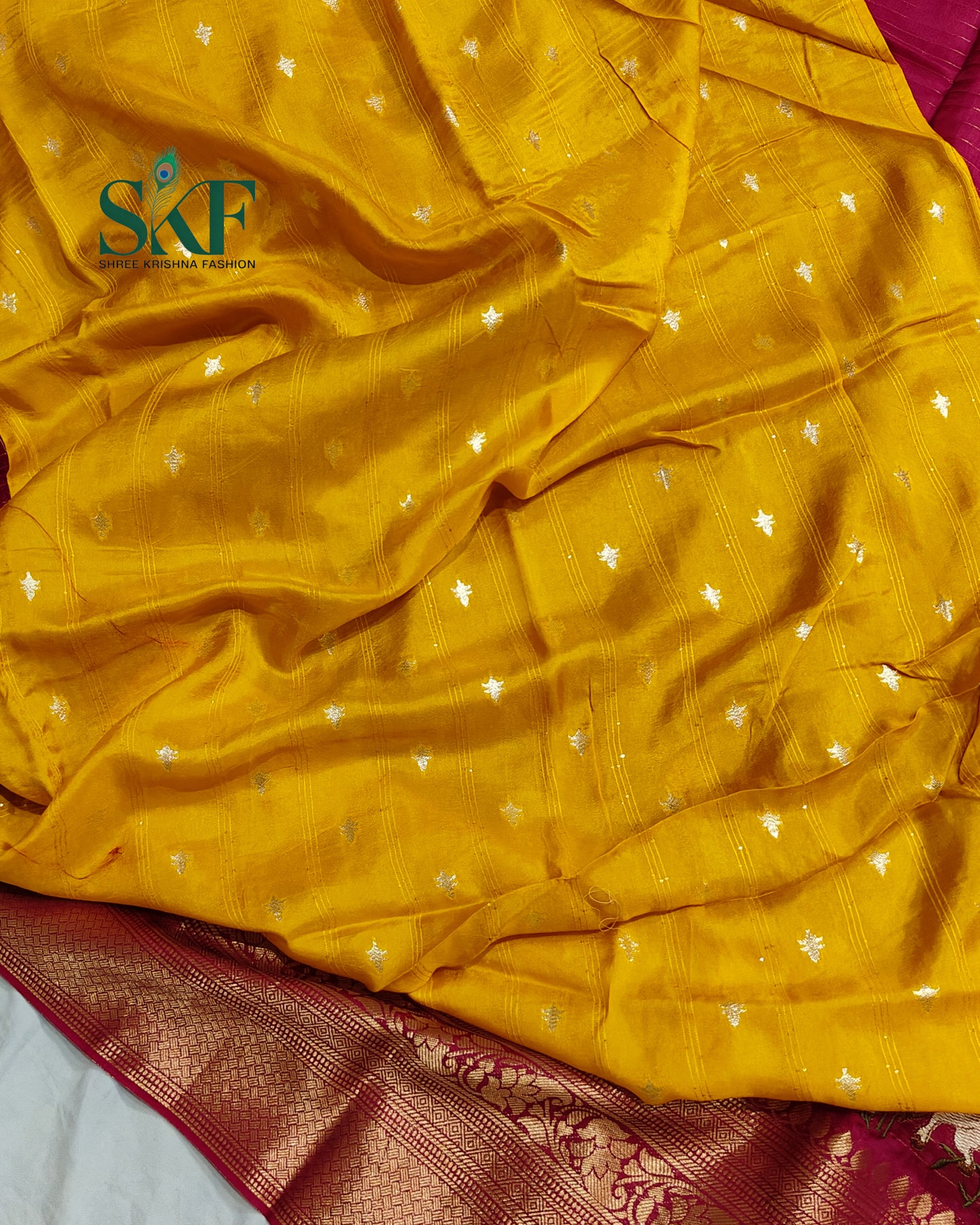 DOLA SILK MOTIF EMBROIDERY PANEL WEAVING BORDER WORK BURGENDY SAREE BY SKFBHOLUBHAI