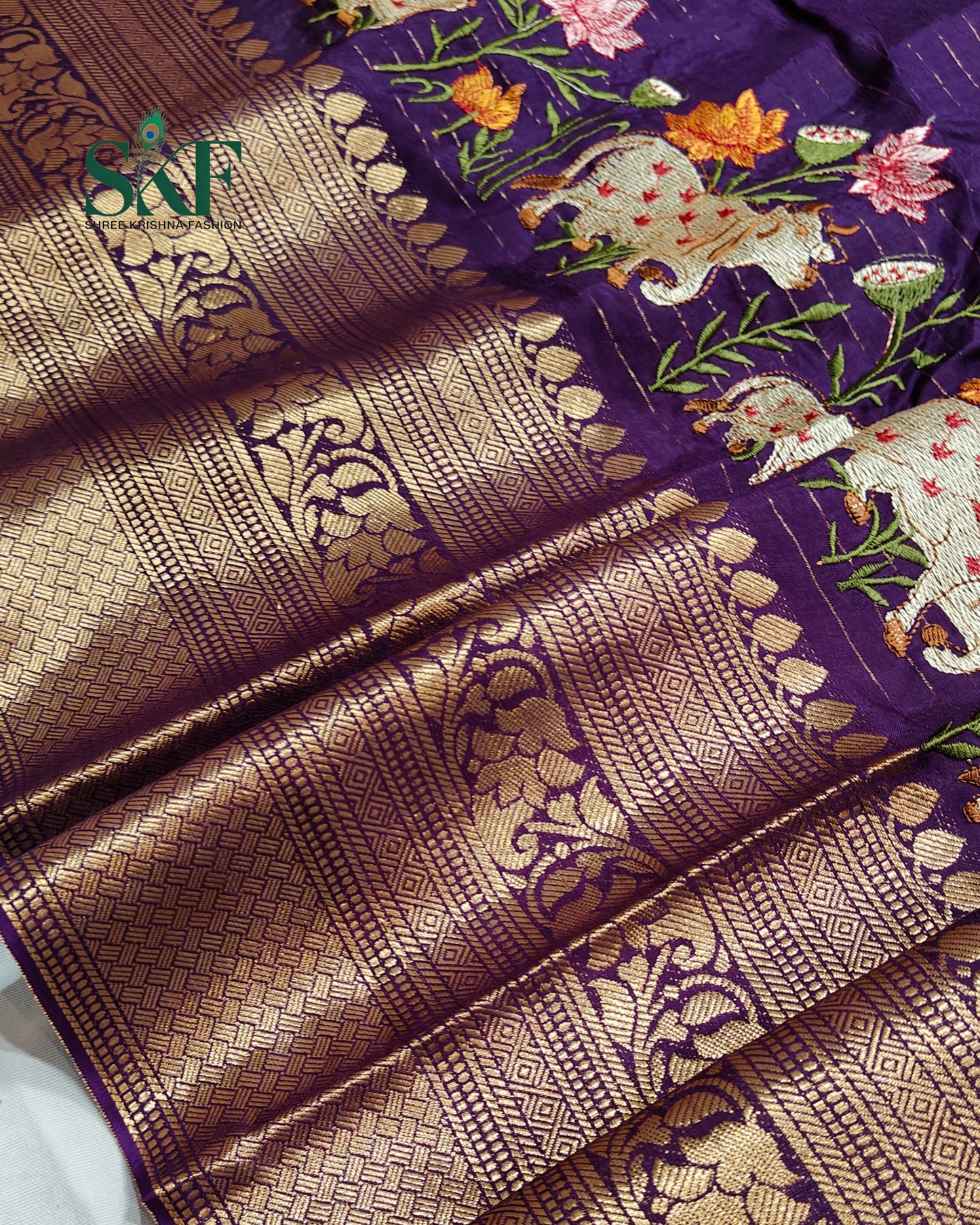 DOLA SILK MOTIF EMBROIDERY PANEL WEAVING BORDER WORK PURPLE SAREE BY SKFBHOLUBHAI