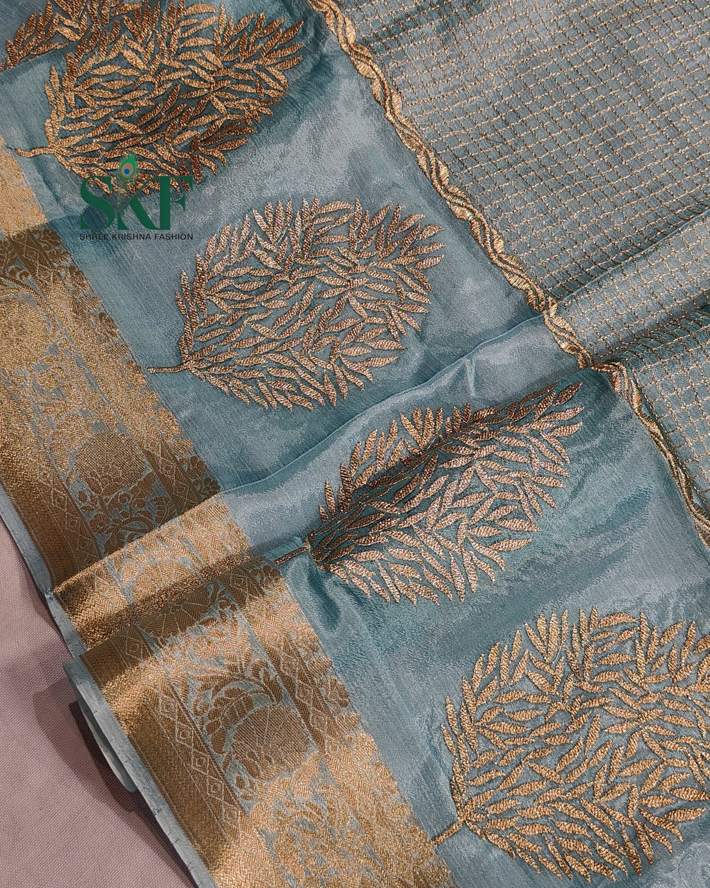 CHINON EMBROIDERY WEAVING BORDER WORK ICEBLUE SAREE BY SKFBHOLUBHAI
