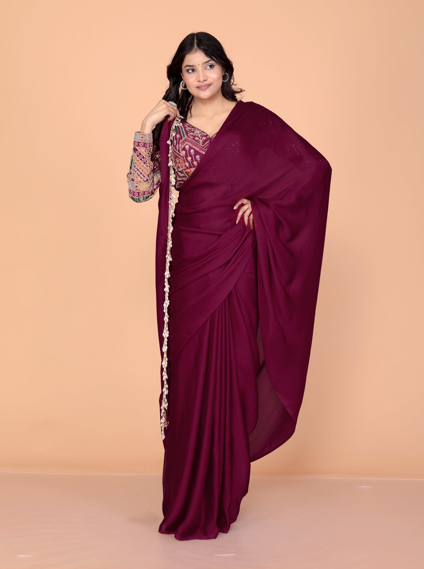 CREPE PLAIN TASSELS WORK BURGENDY SAREE BY SKFBHOLUBHAI