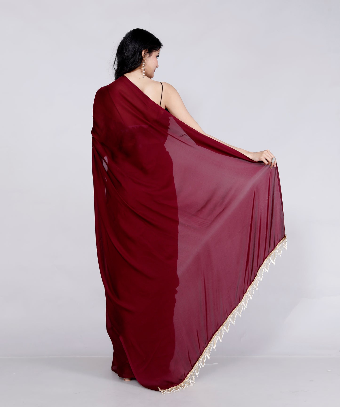 CREPE PLAIN TASSELS WORK MAHROON SAREE BY SKFBHOLUBHAI