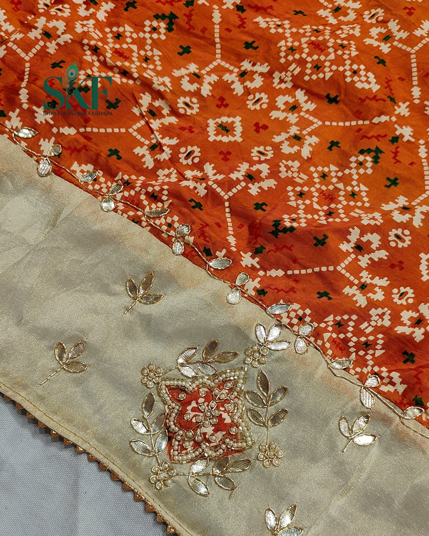 TUSSAR SILK PATOLA PRINT GOTTA HANDWORK BORDER ORANGE SAREE BY SKFBHOLUBHAI