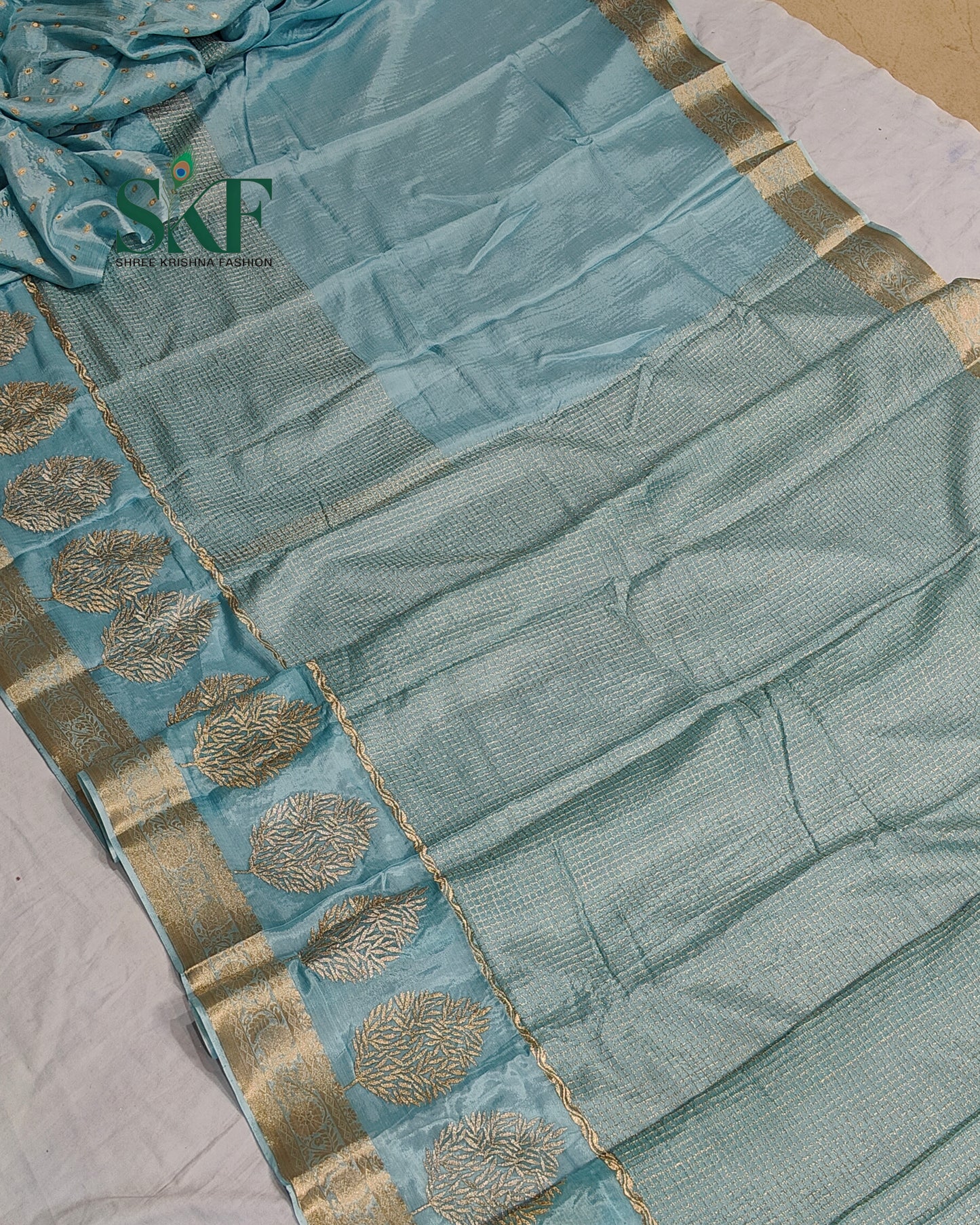 CHINON EMBROIDERY WEAVING BORDER WORK ICEBLUE SAREE BY SKFBHOLUBHAI
