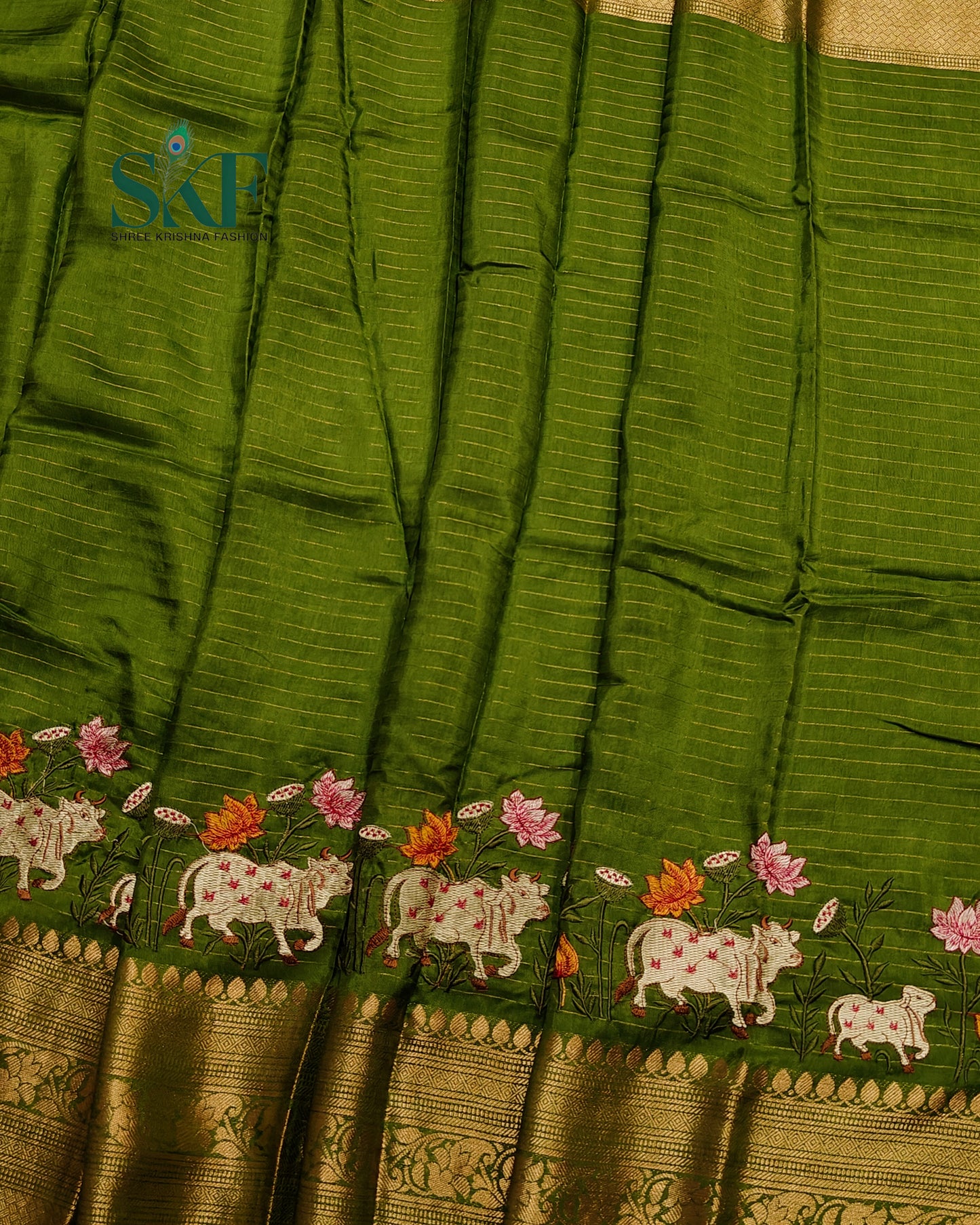 DOLA SILK MOTIF EMBROIDERY PANEL WEAVING BORDER WORK MEHNDI GREEN SAREE BY SKFBHOLUBHAI